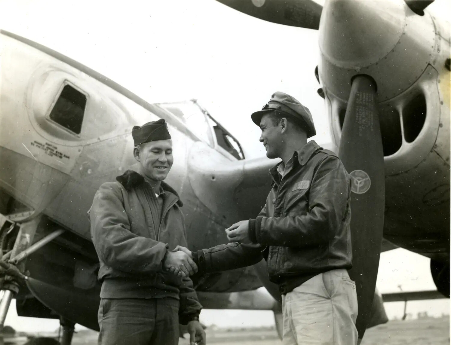 Airmen Shaking Hands Before Twin-Engine Bomber, CBI Theater, WWII