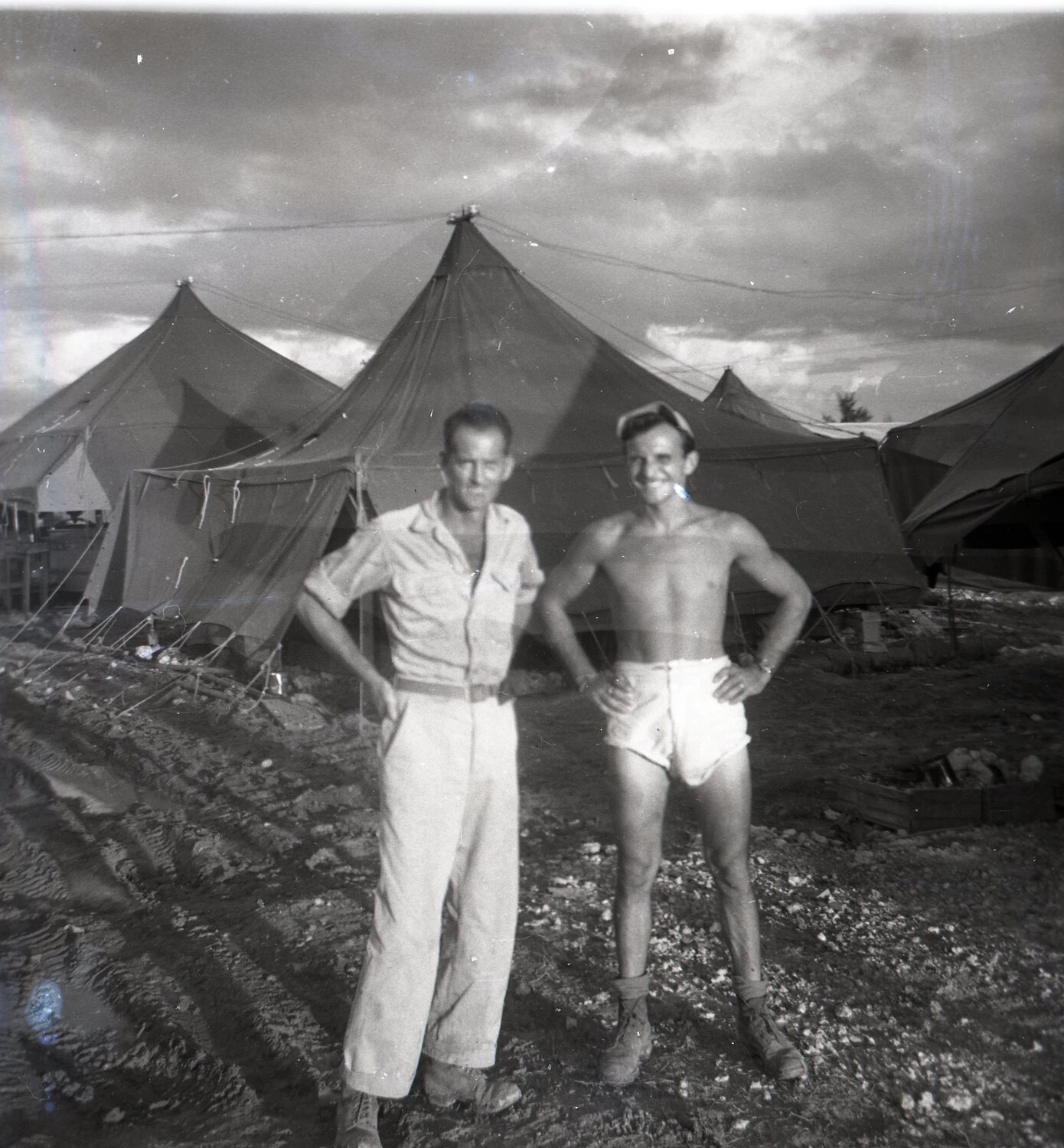 Two Servicemen Posing at Tent Camp — 345th Bombardment Group Encampment, Ie Shima, WWII