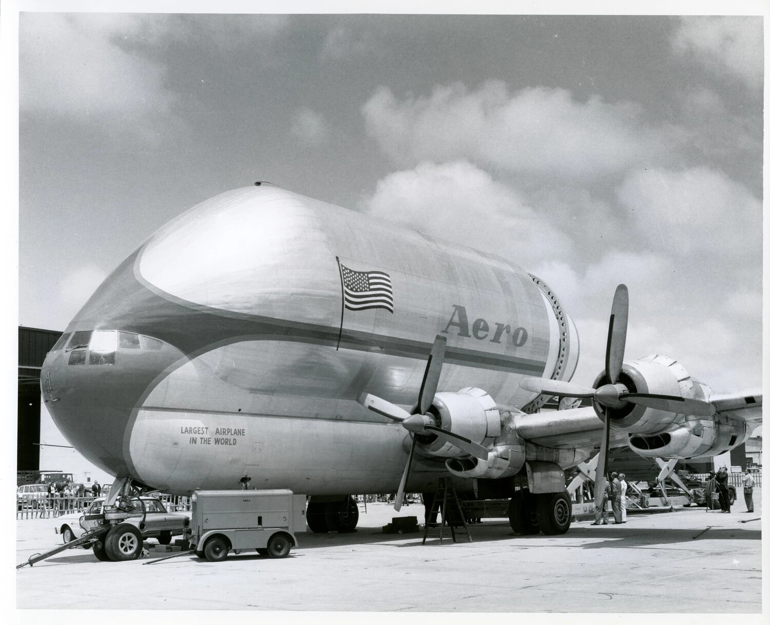 Aero Spacelines 'Guppy' Outsized Cargo Aircraft on Airport Ramp, 'Largest Airplane in the World'