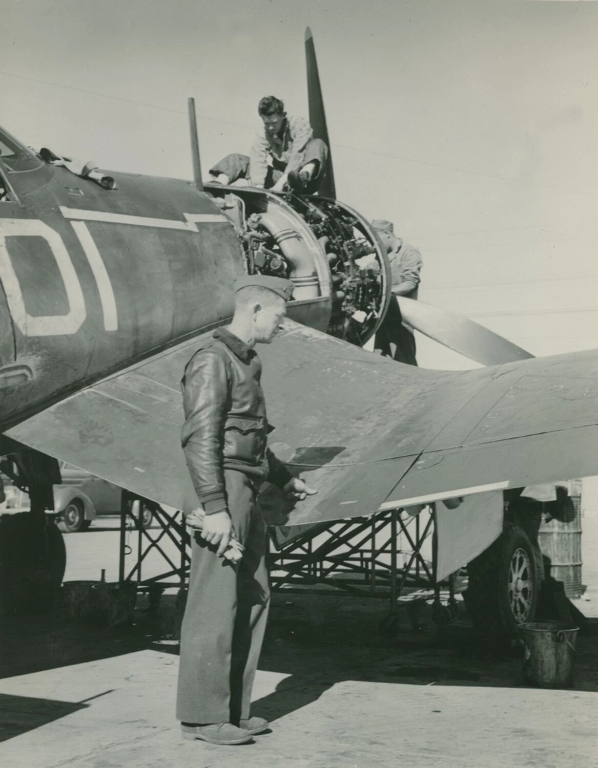 Ground Crew Servicing a Navy/Marine Radial Fighter