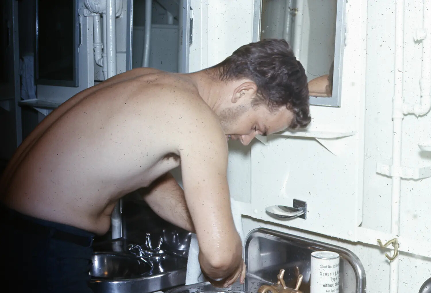 Sailor Washing Up at a Shipboard Sink, USS Ticonderoga