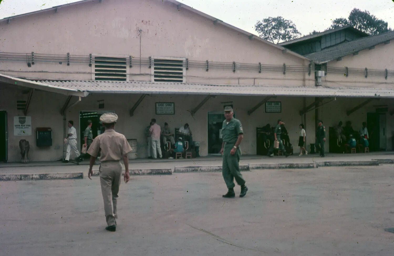 Base Exchange Arcade with Shoe Shine Stands and Barbershop, U.S. Air Base, South Vietnam, 1965