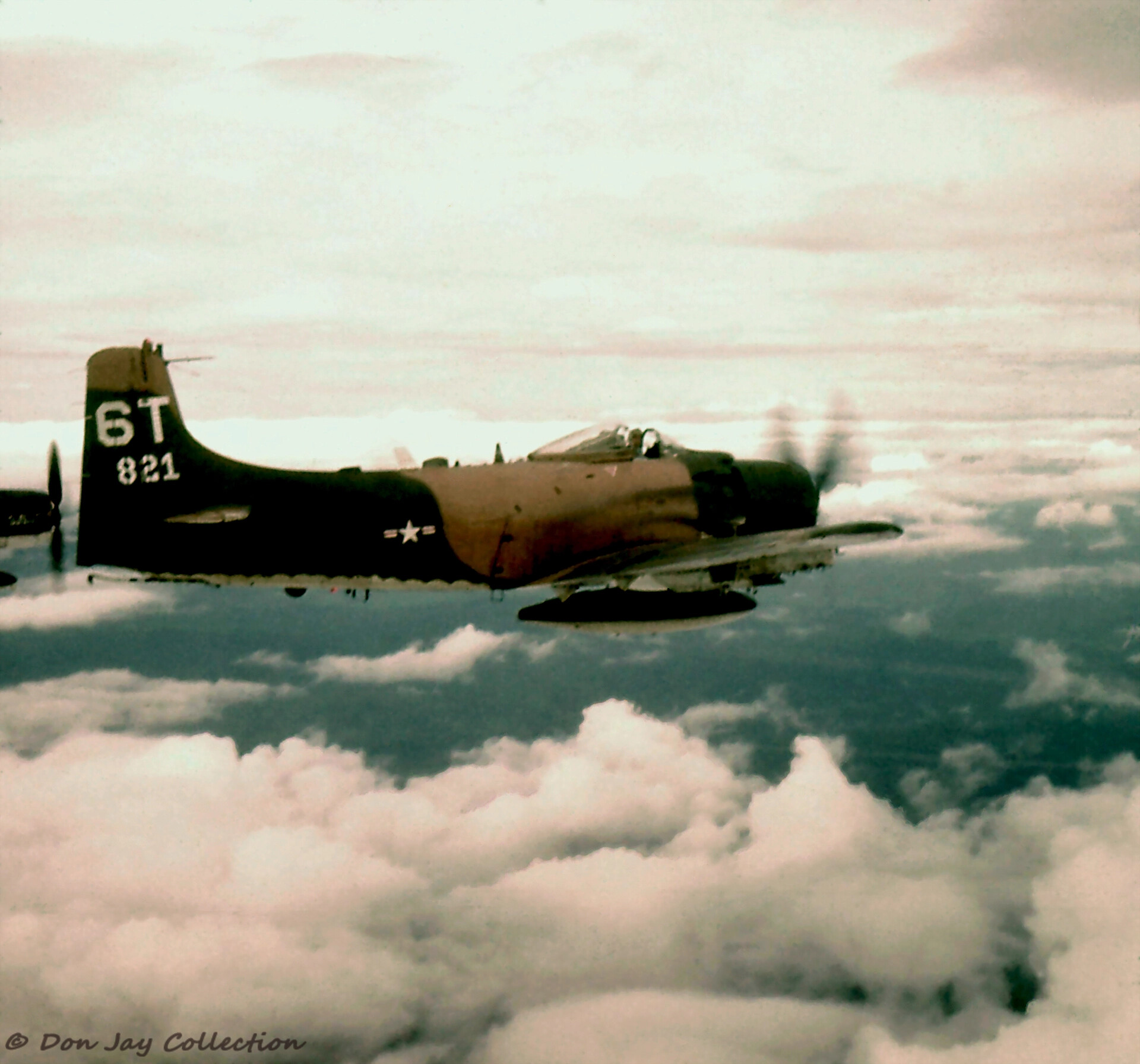 A-1H Skyraider 139821, Tail Code "6T," 633rd Special Operations Wing, In Flight Above Clouds