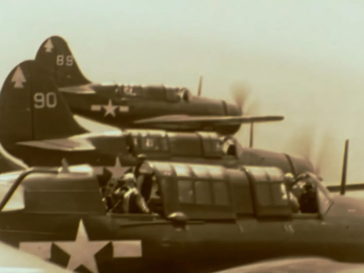 Formation of U.S. Navy Dive Bombers, Tail Numbers 89 and 90, Film Still from Yamato Strike Mission, April 1945