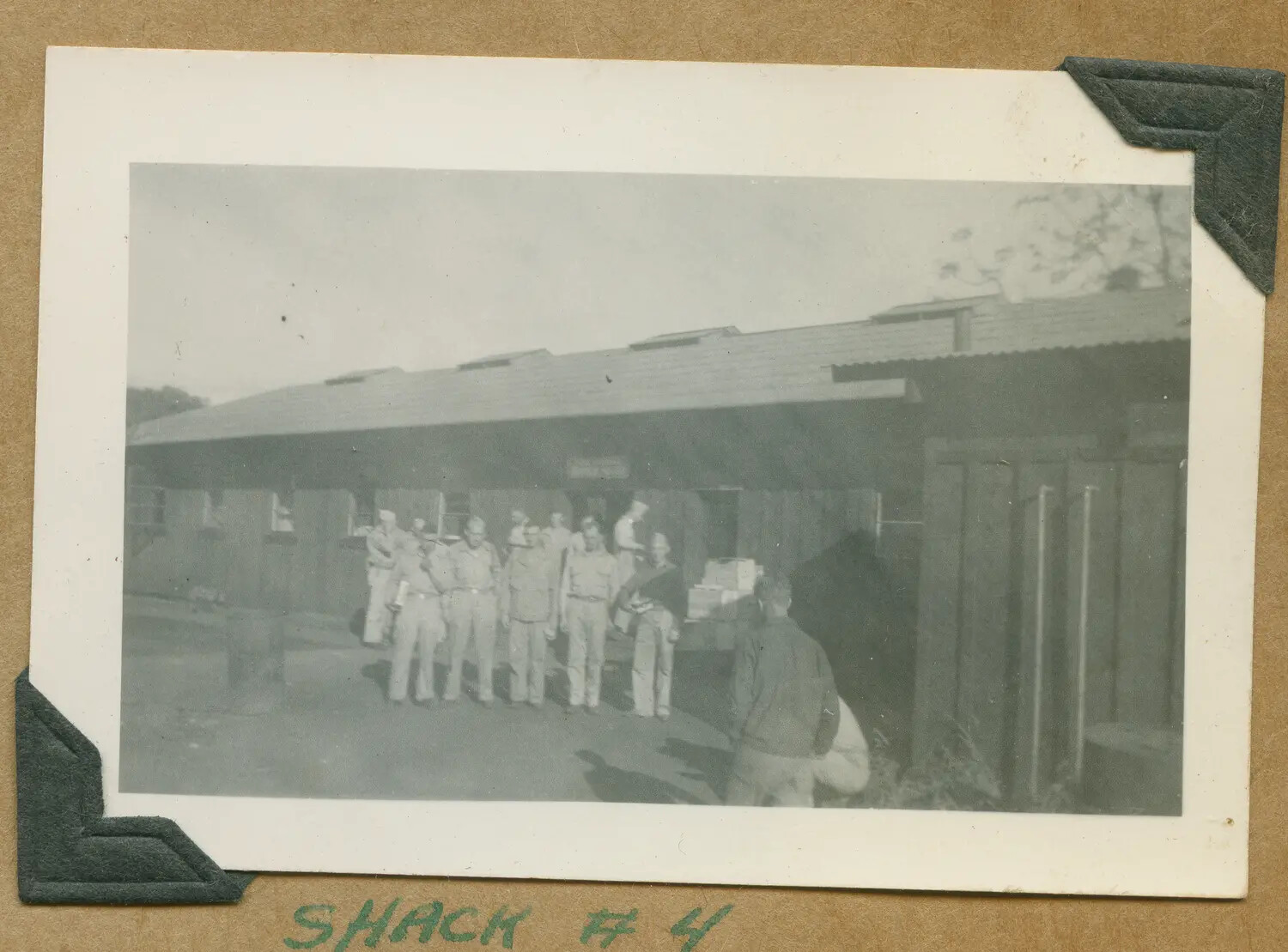 Formation of Soldiers at 'Shack #4,' WWII Training Camp Barracks