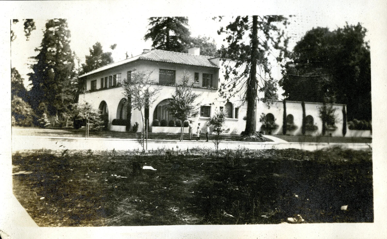 Spanish Colonial Revival Residence with Figures on Sidewalk, California, c. 1917-1918