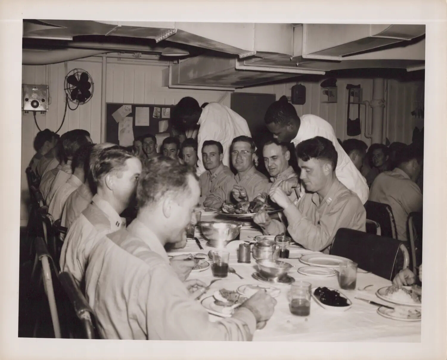 Officers Enjoying a Formal Wardroom Meal Aboard Ship, WWII