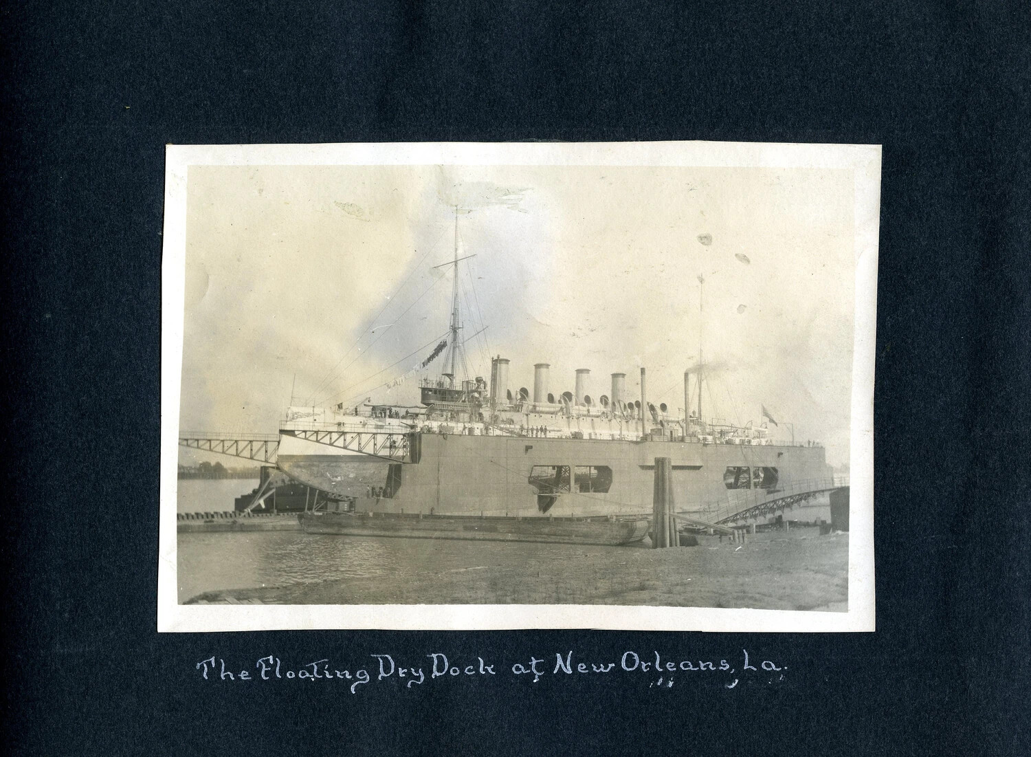 The Floating Dry Dock at New Orleans, Louisiana, with a Multi-Funnel Steamship, c. 1905