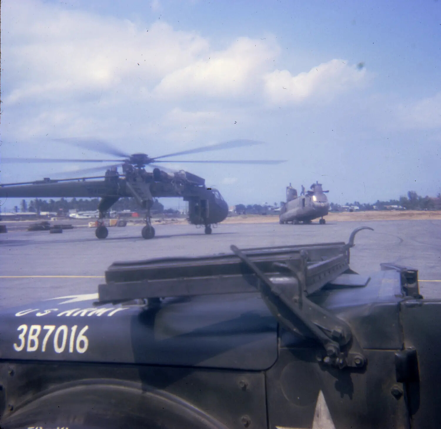CH-54 Tarhe 'Skycrane' and CH-47 Chinook on Flight Line, South Vietnam
