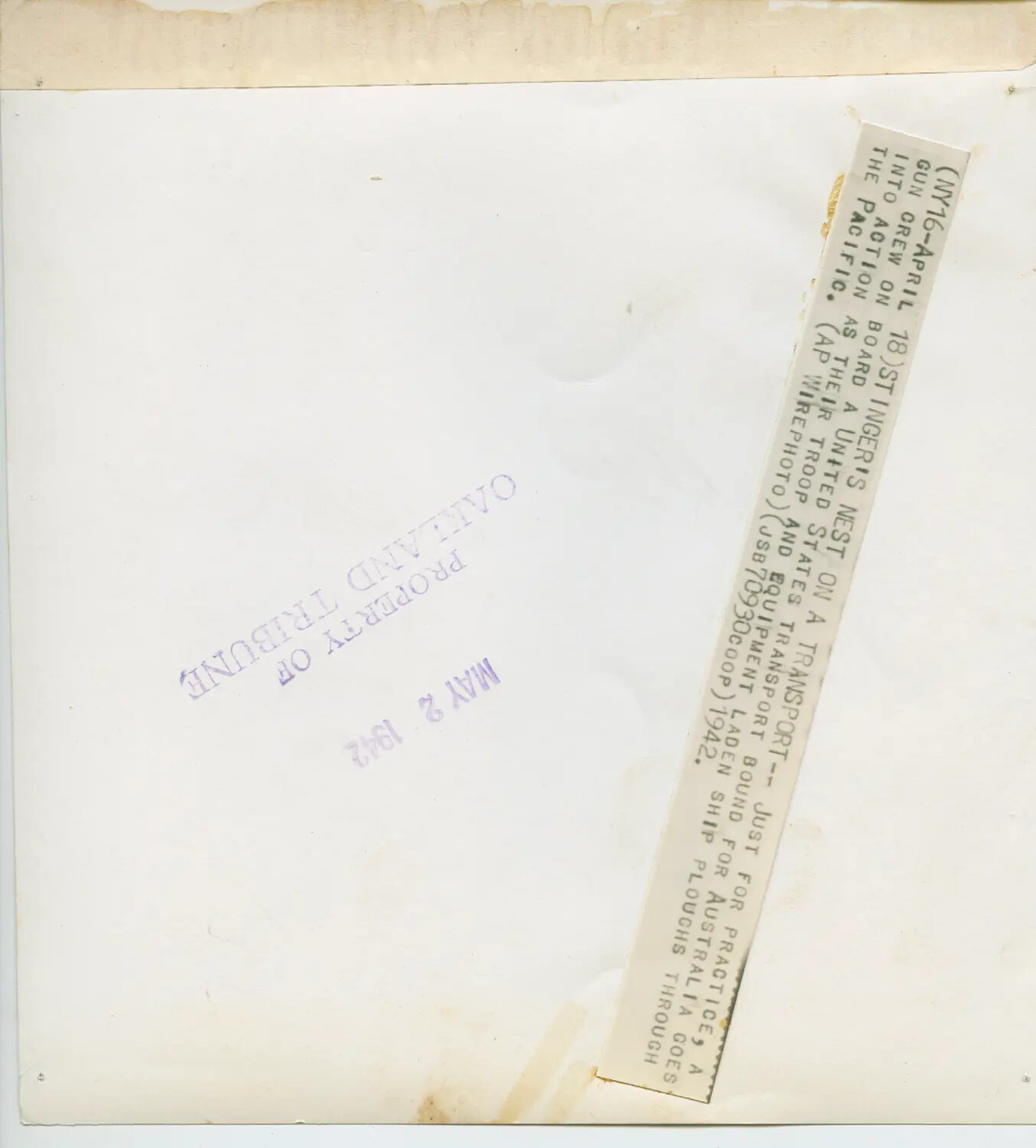 Verso of AP Wirephoto Press Print: Gun Crew Drill Aboard Troop Transport Bound for Australia, 1942