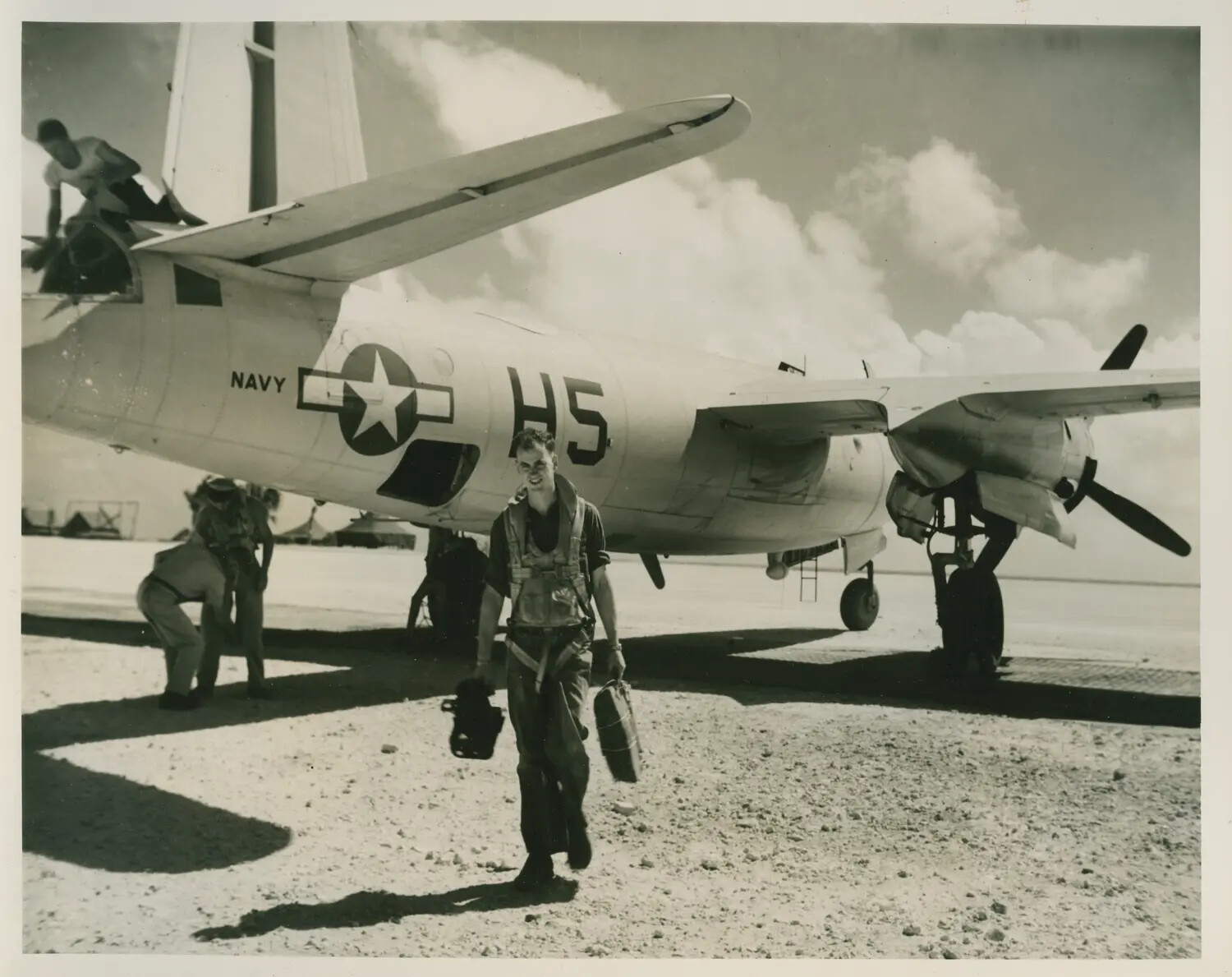Navy Aircrewman Walking from a Twin-Engine Patrol Bomber (Side Code 'H5'), Pacific Theater