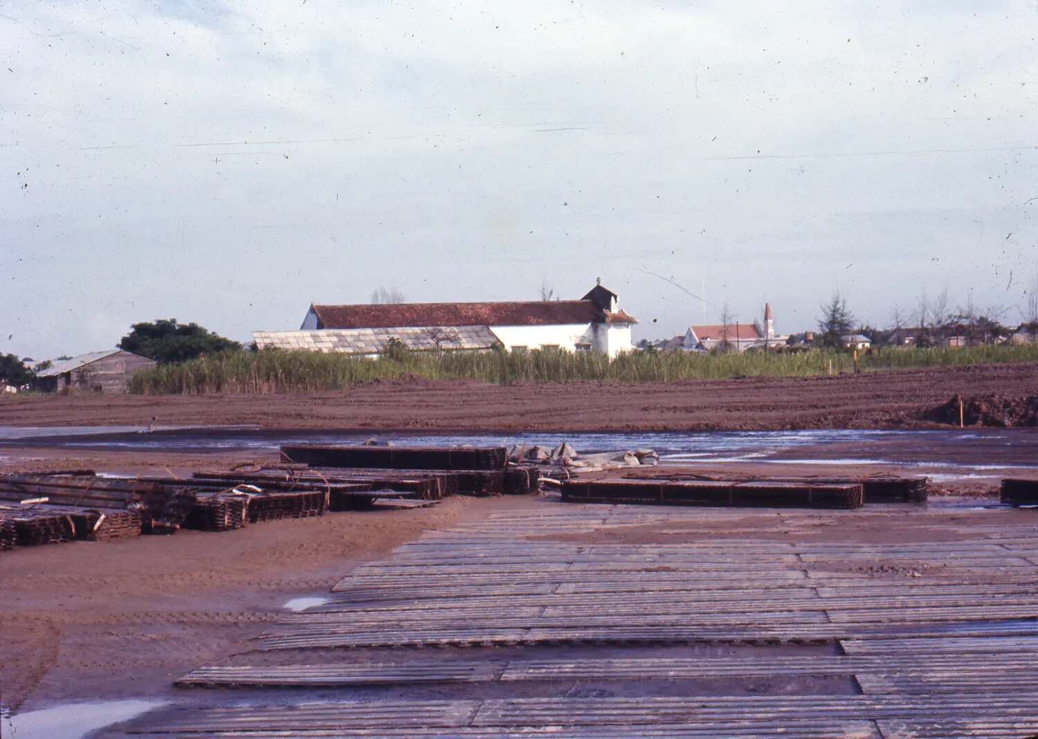 Perforated Steel Planking Staged Near a Vietnamese Village, Vietnam War-Era 35mm Slide
