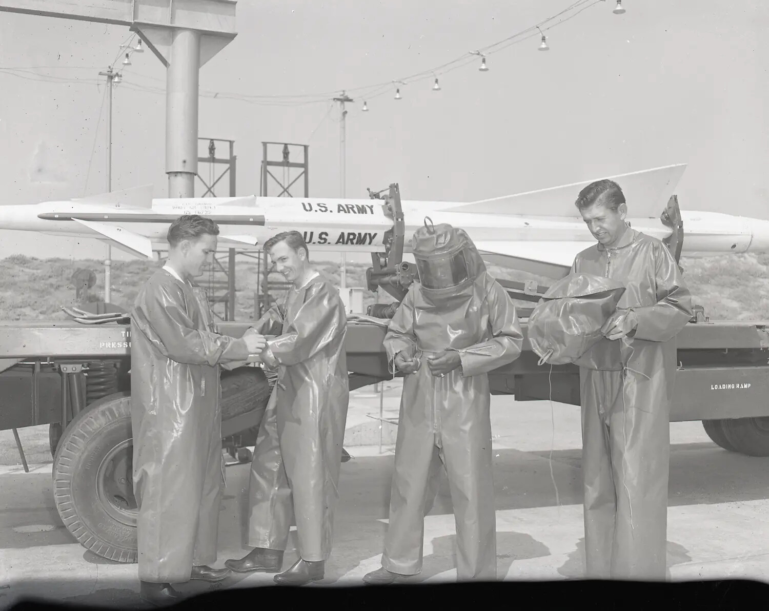 National Guard Personnel in Protective Suits Handling U.S. Army Guided Missile