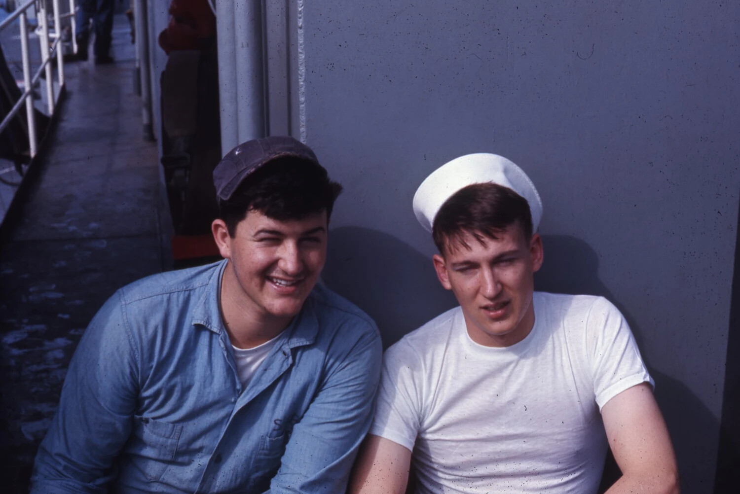 Two Sailors Share a Laugh Aboard Ship, Vietnam War Era