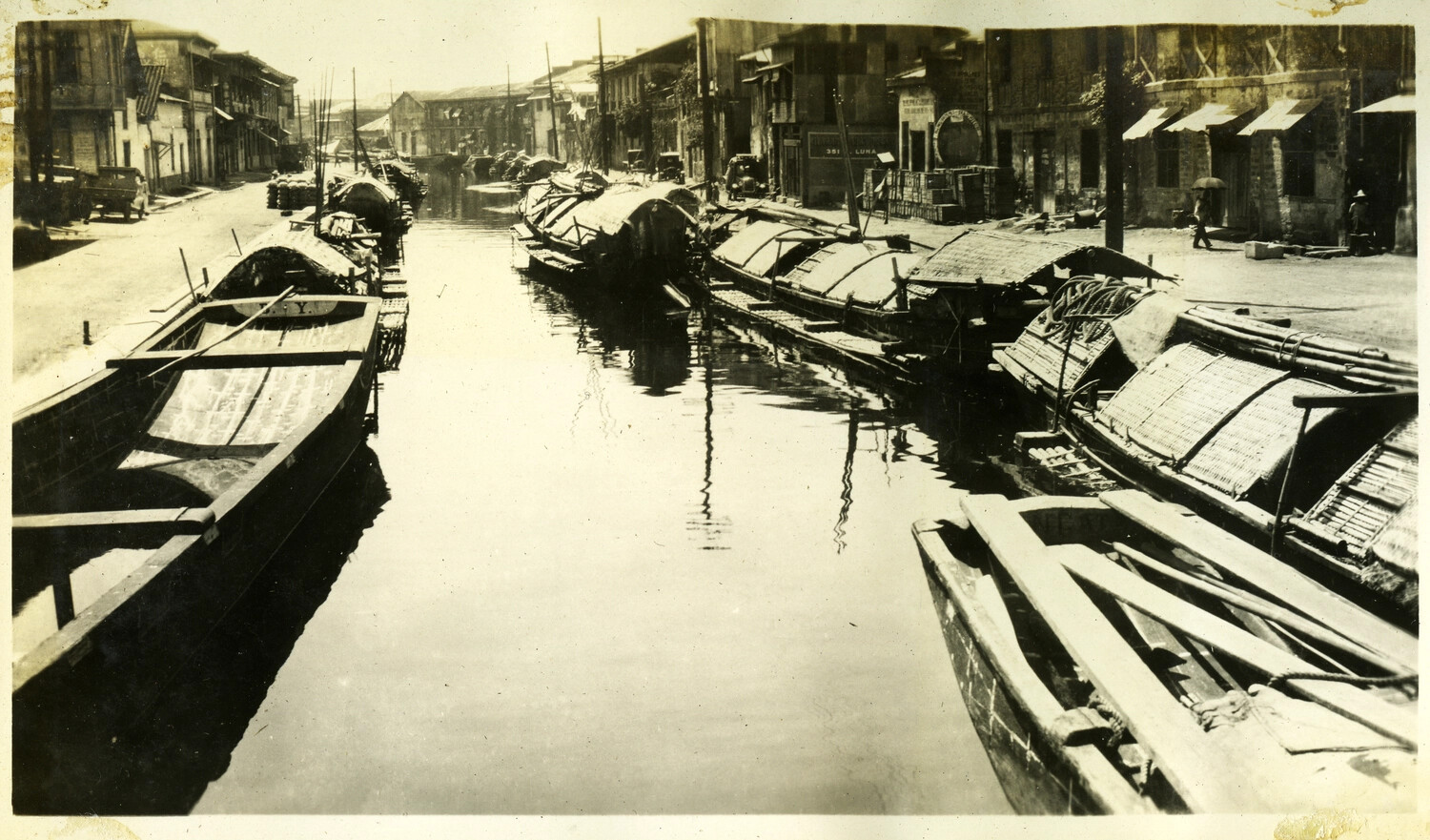 Canal Scene with Moored Cargo Boats (Cascos), Manila, Philippines, Early 20th Century