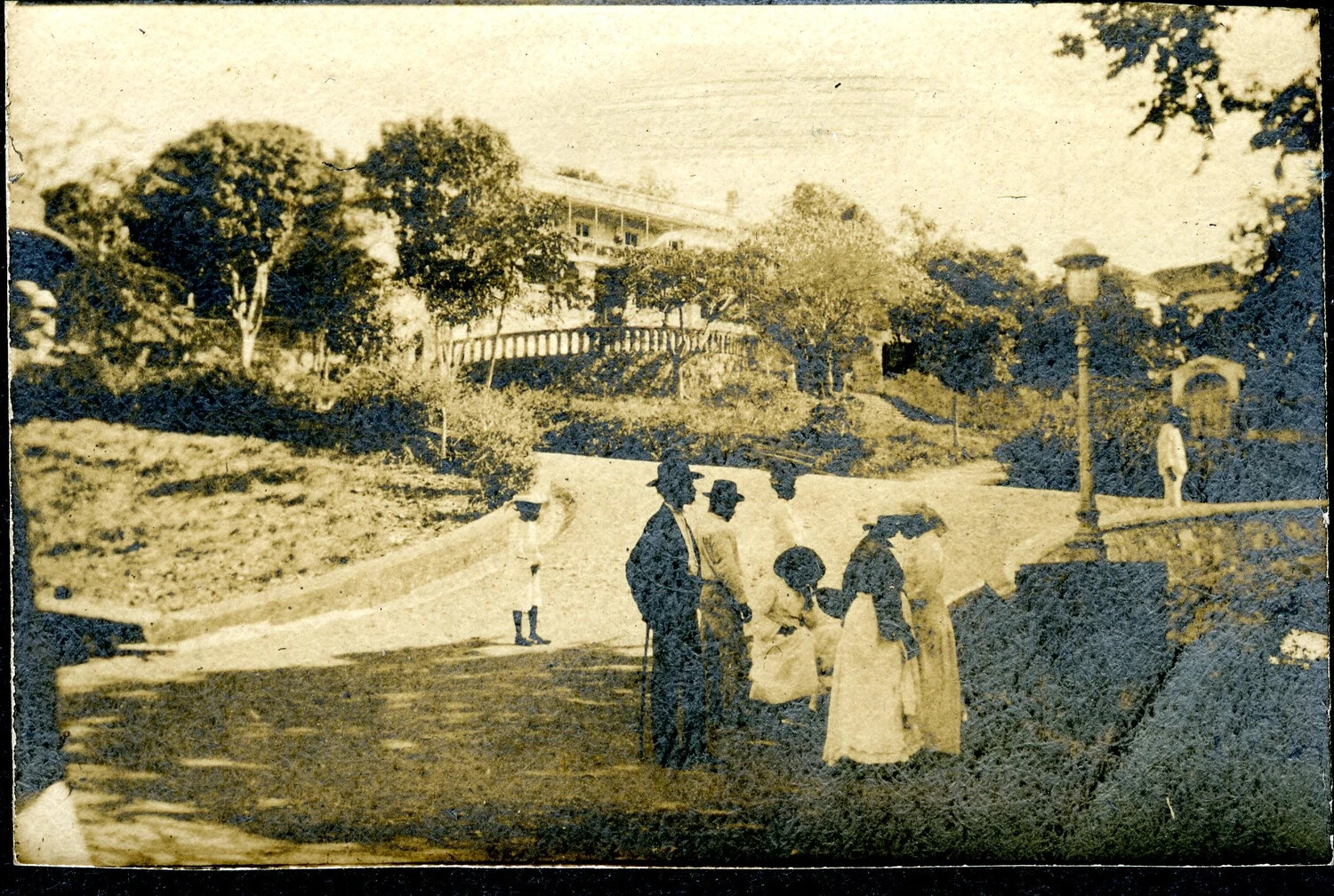 Promenade Scene with Civilians in Park, Tropical Port of Call, USS Columbia Album, c. 1898-1908