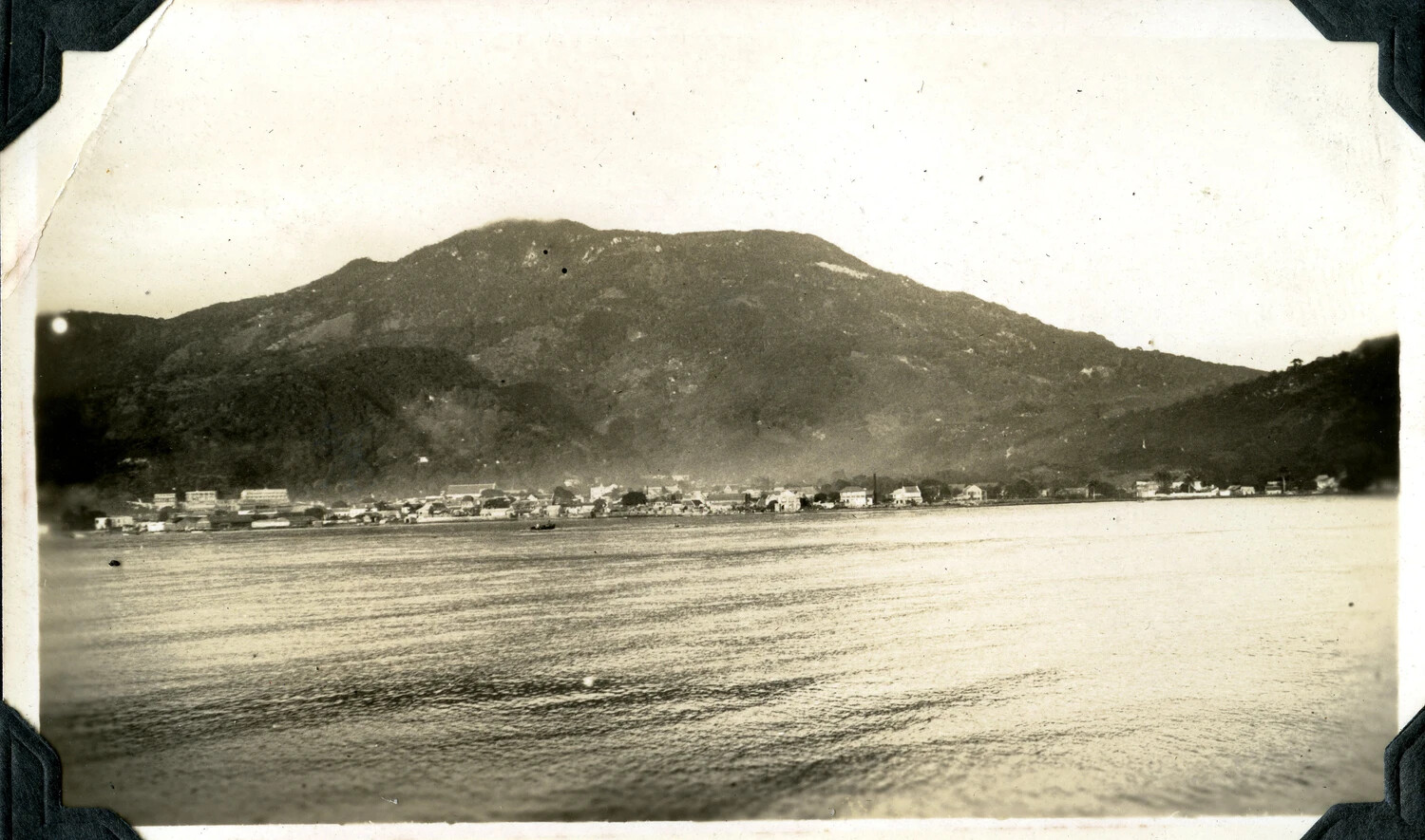 Coastal Harbor Town Beneath a Mountain, Signal Corps Photo Album