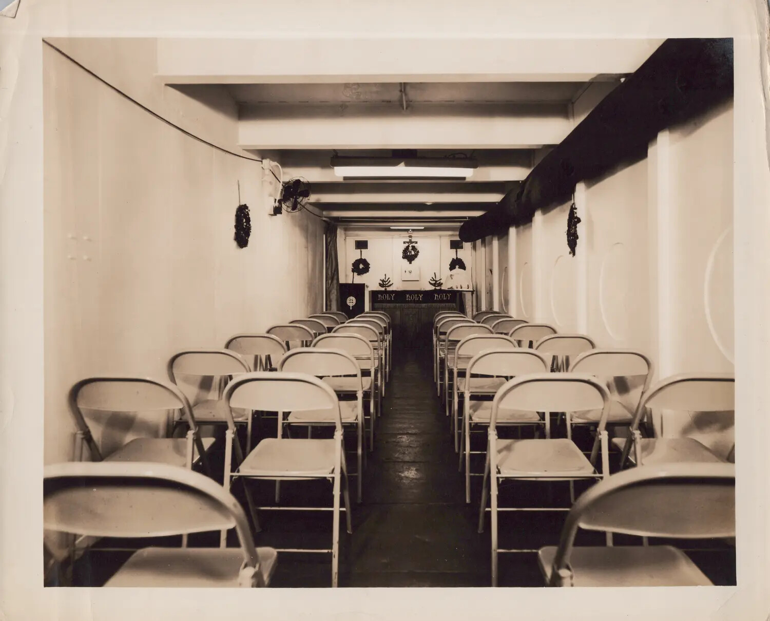 Shipboard Chapel Decorated for Christmas Aboard U.S. Navy Escort Carrier, WWII