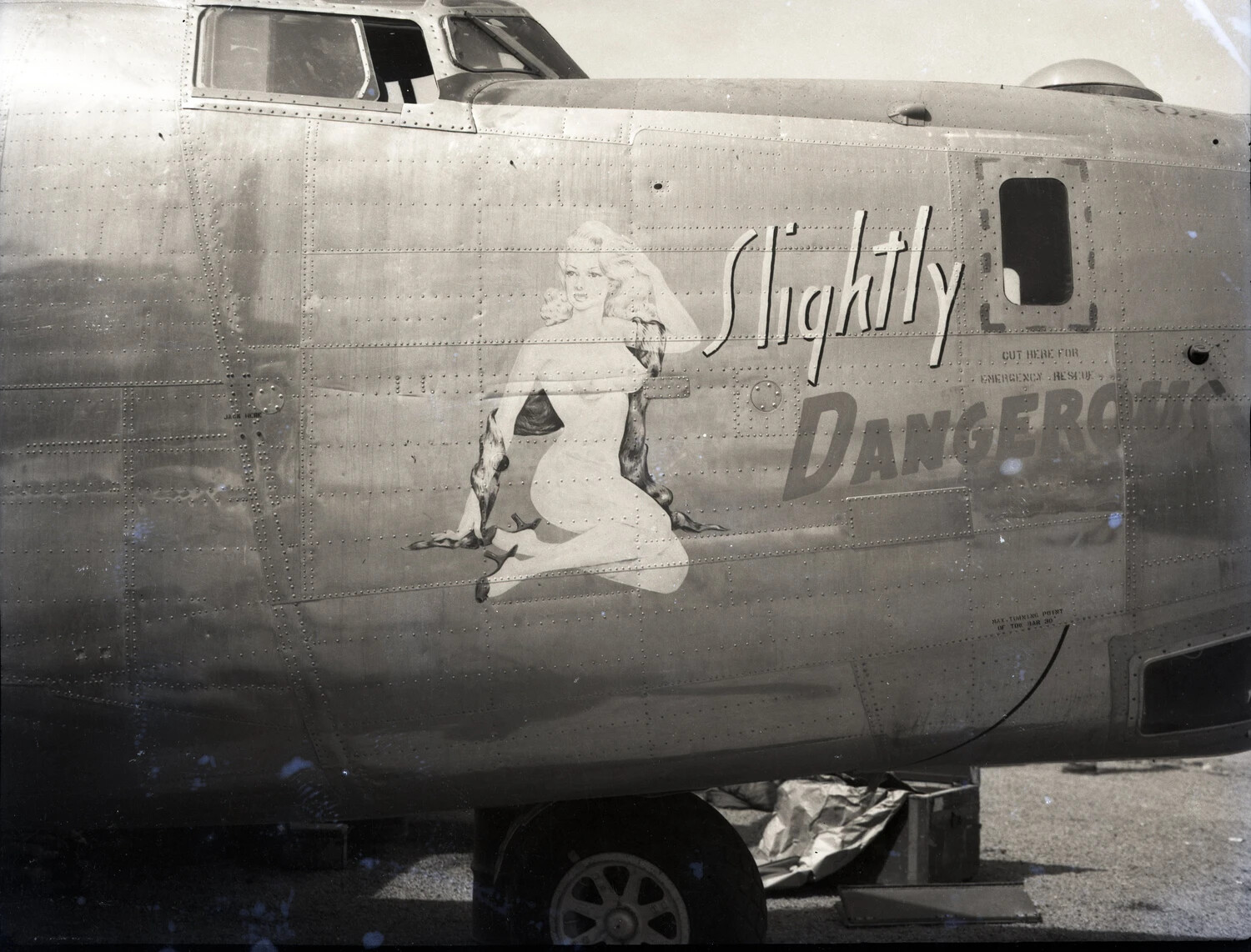 Nose Art "Slightly Dangerous" on B-25 Mitchell Fuselage, 345th Bombardment Group, WWII Pacific Theater