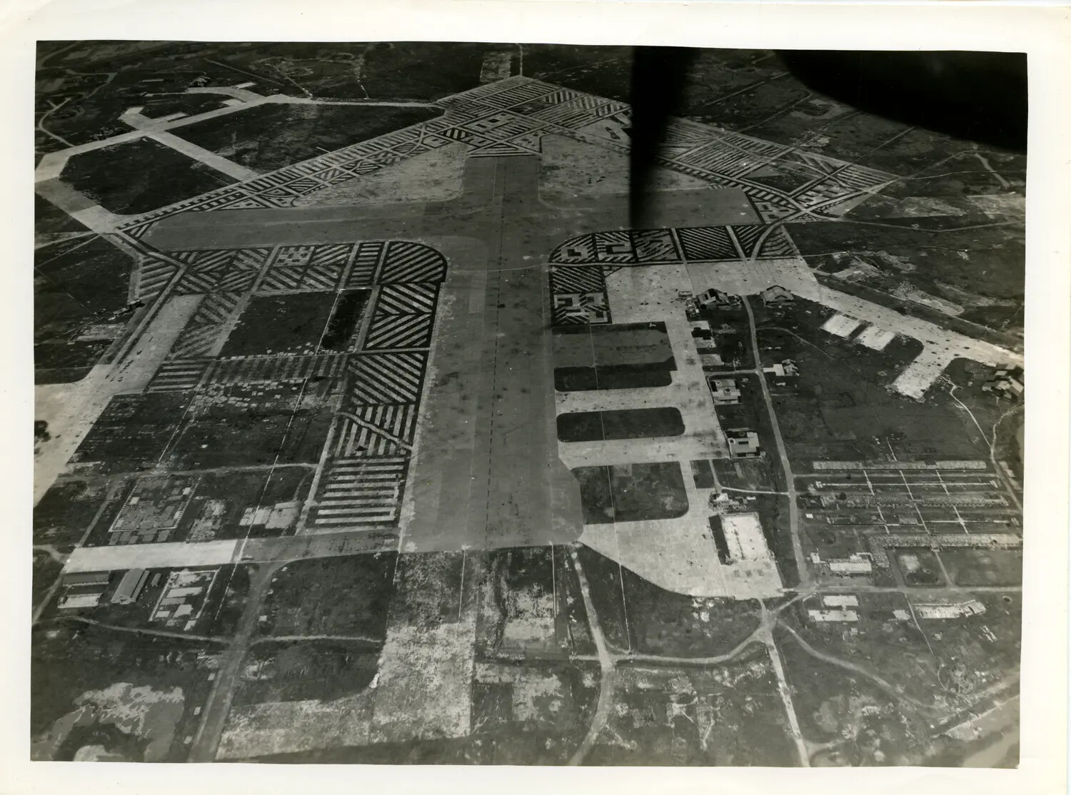 Aerial Reconnaissance Photograph of Airfield with Camouflaged Dispersal Areas, WWII CBI Theater