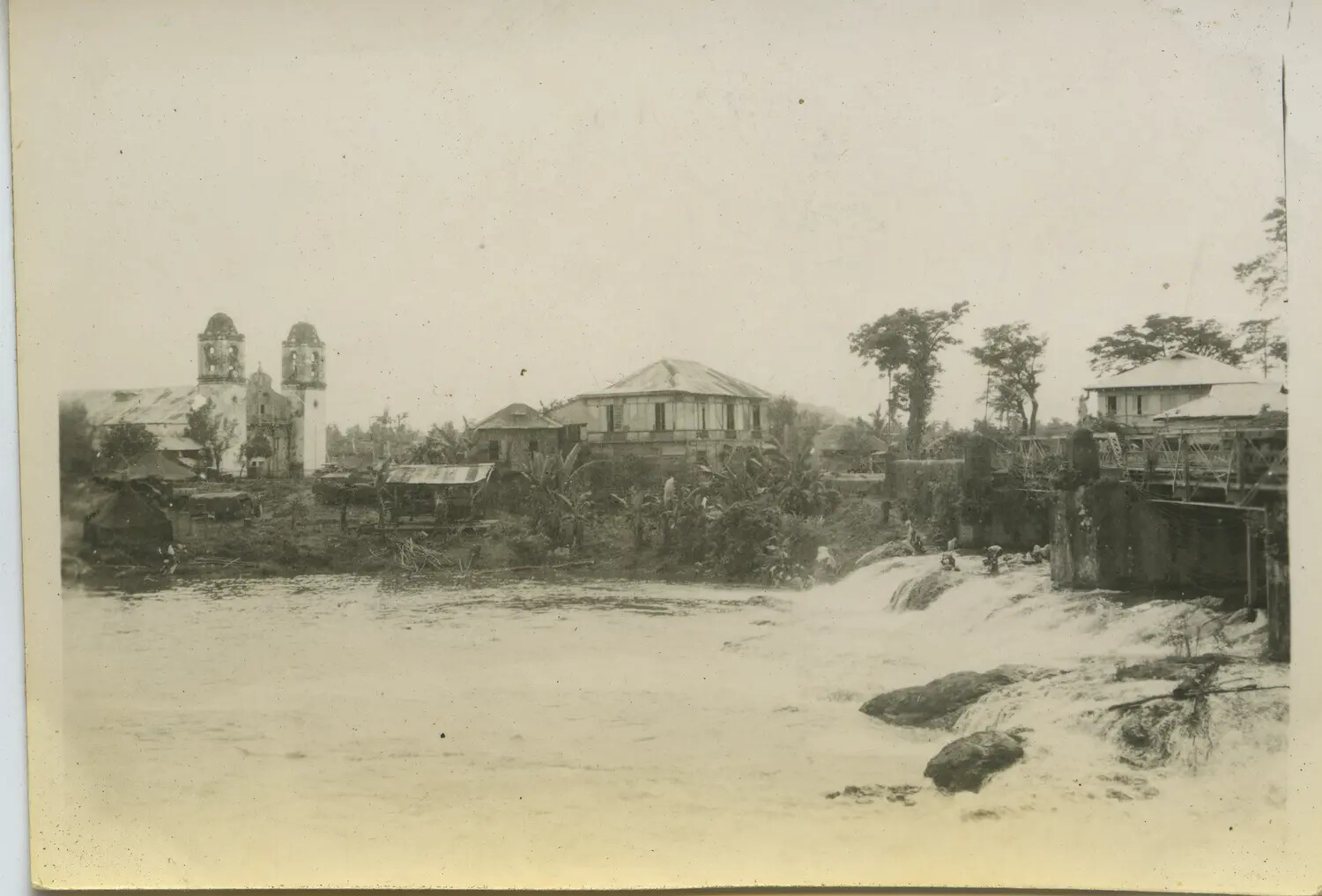 Philippine Riverside Town with Colonial Church and Damaged Bridge, 312th Bomb Group Collection, WWII Pacific Theater