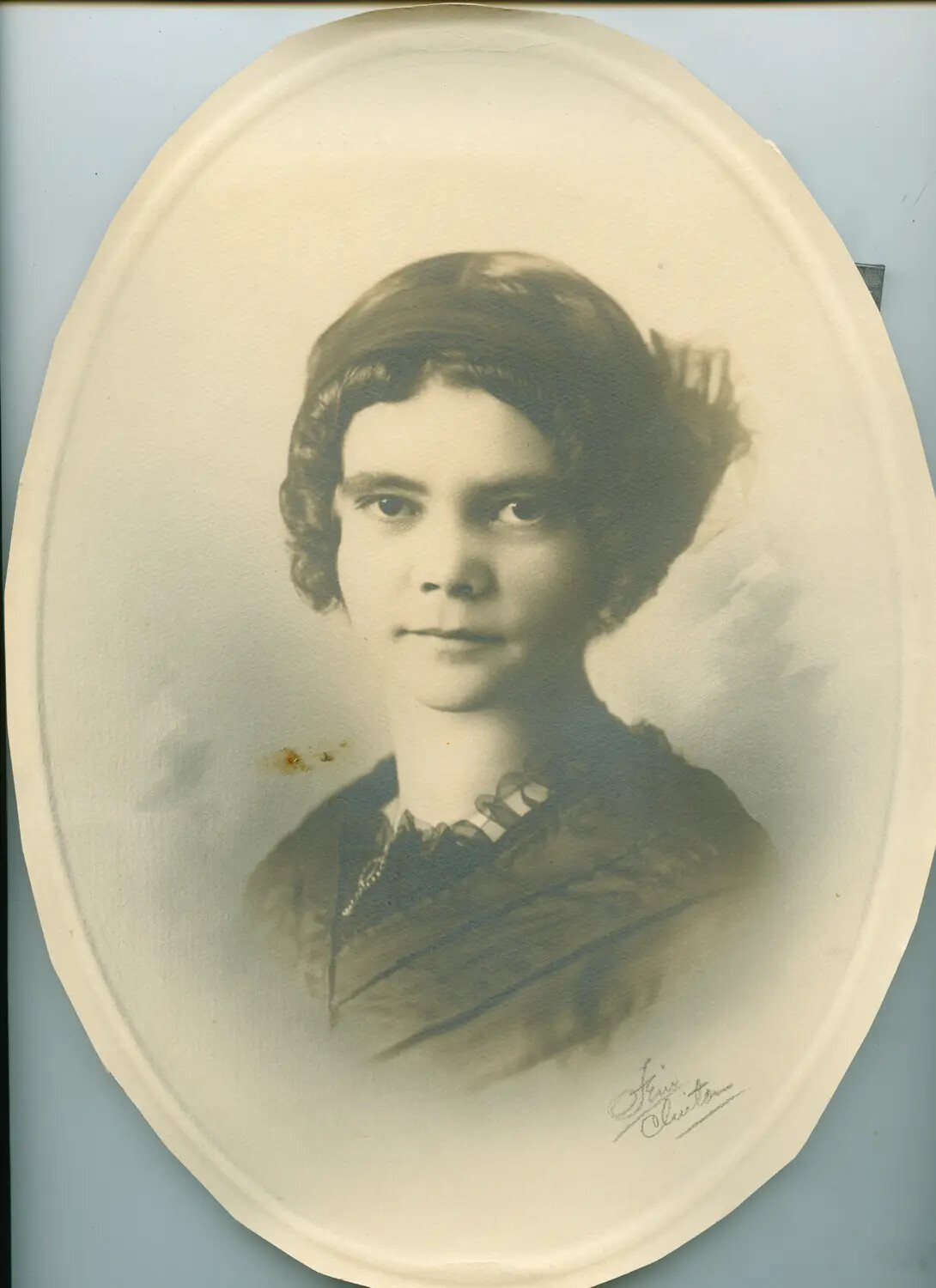 Hand-Tinted Studio Portrait of a Young Woman, Oval Mount, Early-to-Mid 20th Century