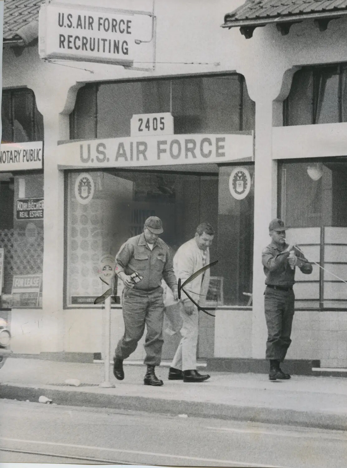 U.S. Air Force Recruiting Storefront with Airmen and Prospective Recruit, Street View