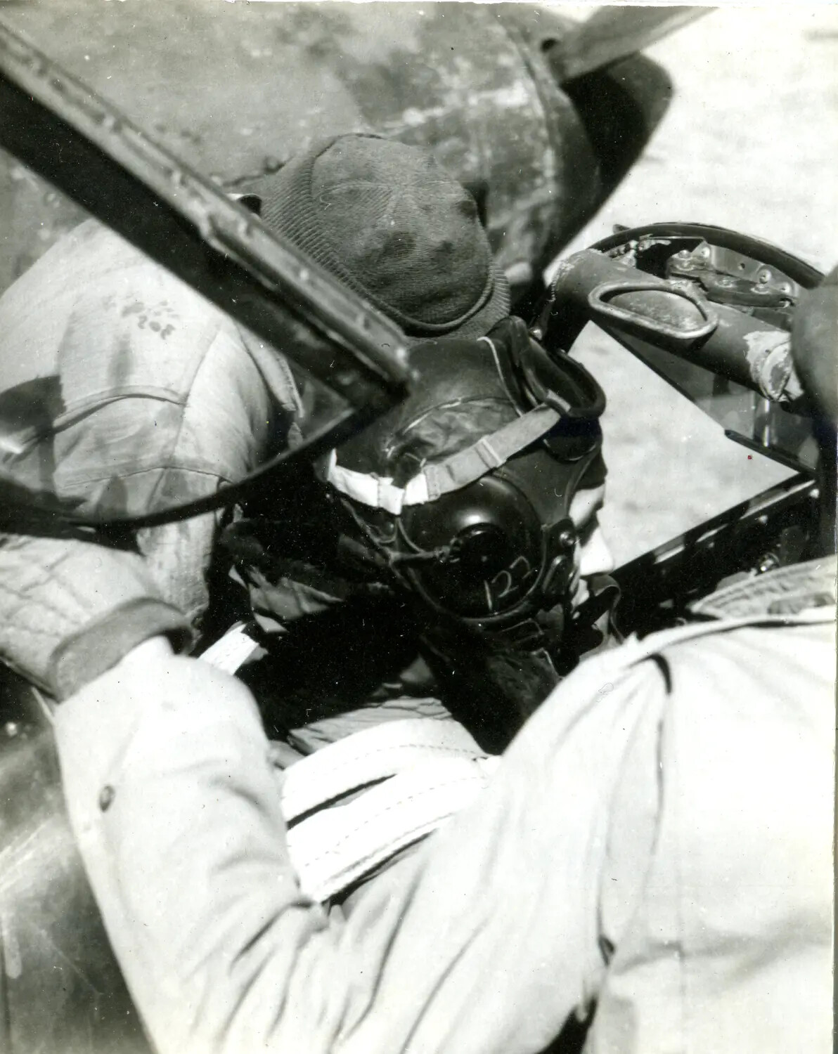 Aircrew Member Wearing Oxygen Mask and Wool Cap in Cockpit, China-Burma-India Theater, WWII