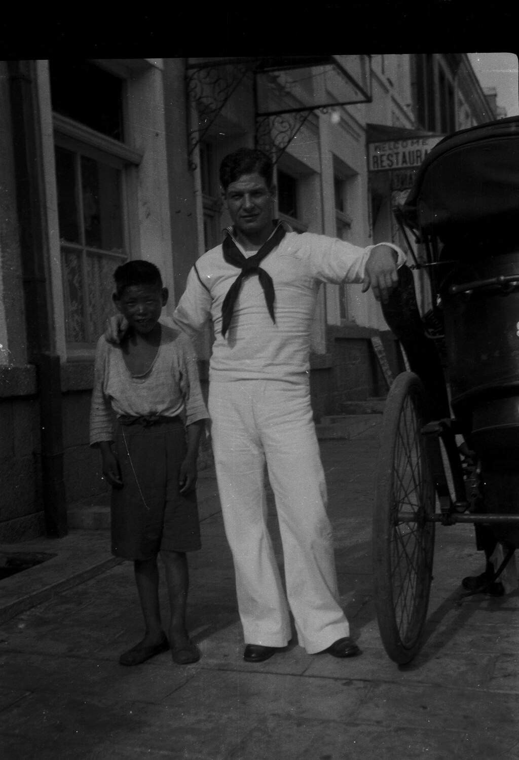U.S. Navy Sailor with Local Boy and Rickshaw, China, 1930s (Pre-WWII China Station Collection)