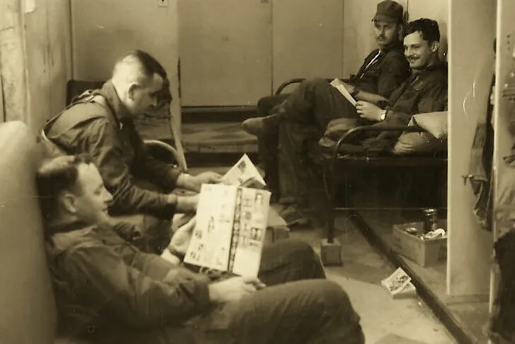 Aircrew in the Ready Room, Hot Pad Alert Area, Chu Lai Air Base, Vietnam — Kurt Wilbrecht and William Pepper (Upper Right)