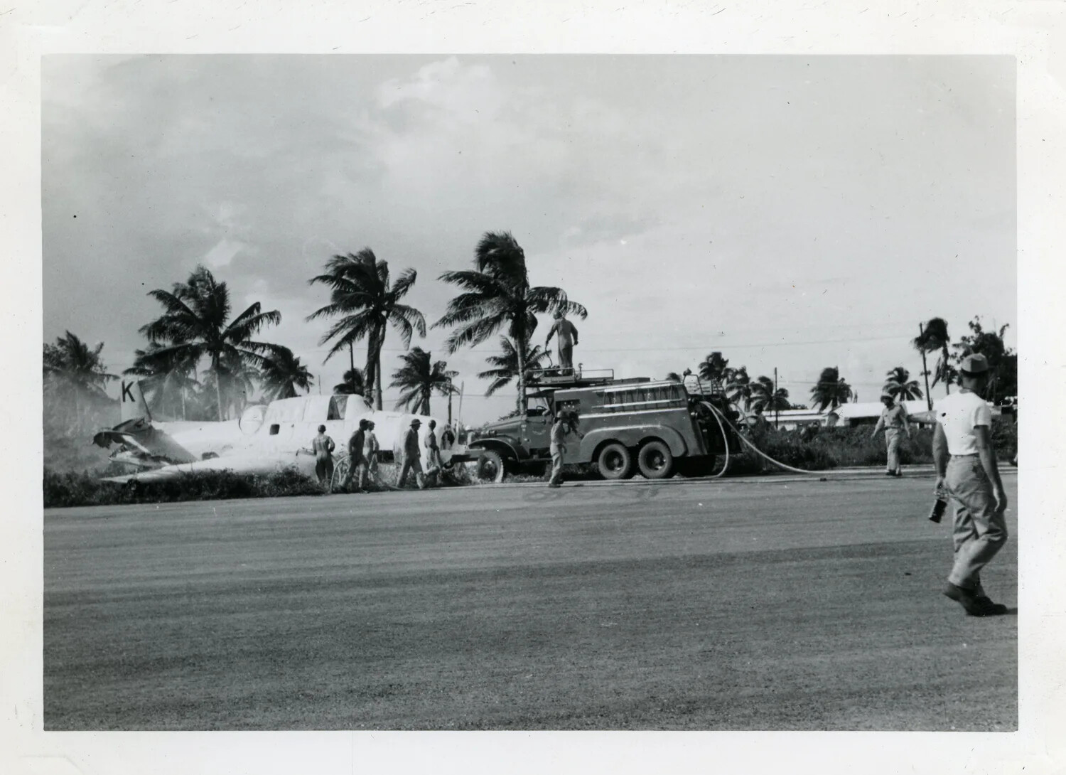 Damaged Aircraft and Fuel Truck at Pacific Island Airfield, VR-6 Squadron Album, Guam