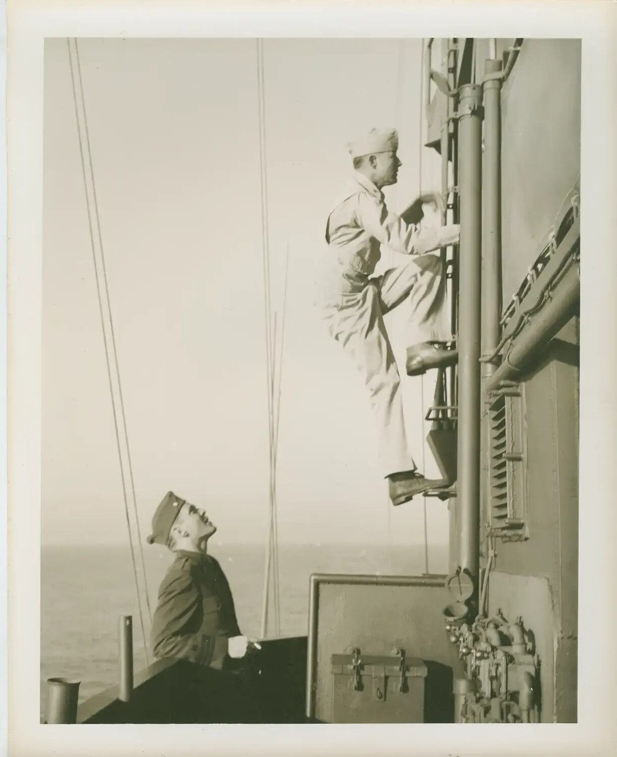 Sailors at Work on Ship's Superstructure Aboard USS Petrof Bay (CVE-80), WWII
