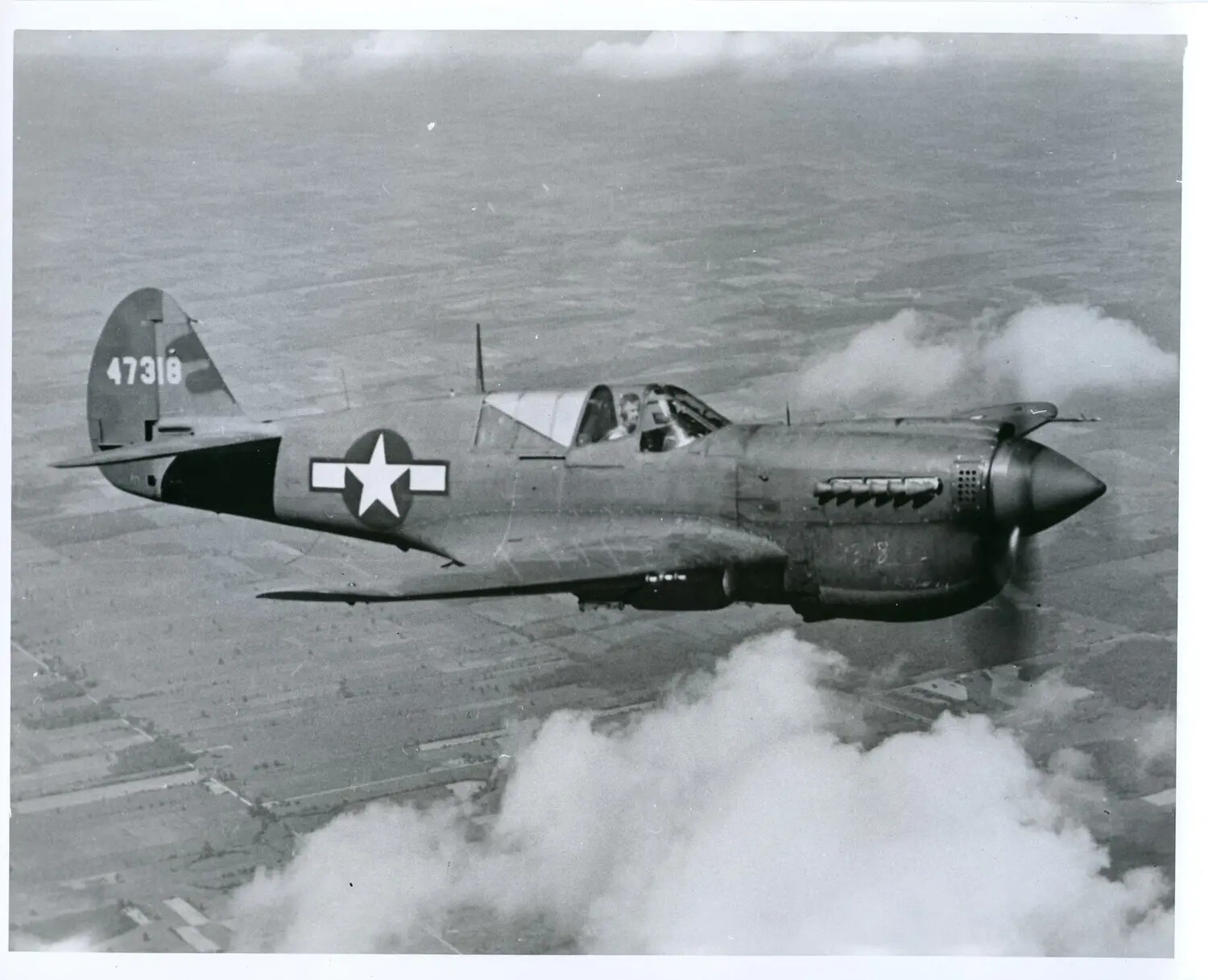 Curtiss P-40 Warhawk in Flight, Tail Number 47318, USAAF WWII Publicity Photograph