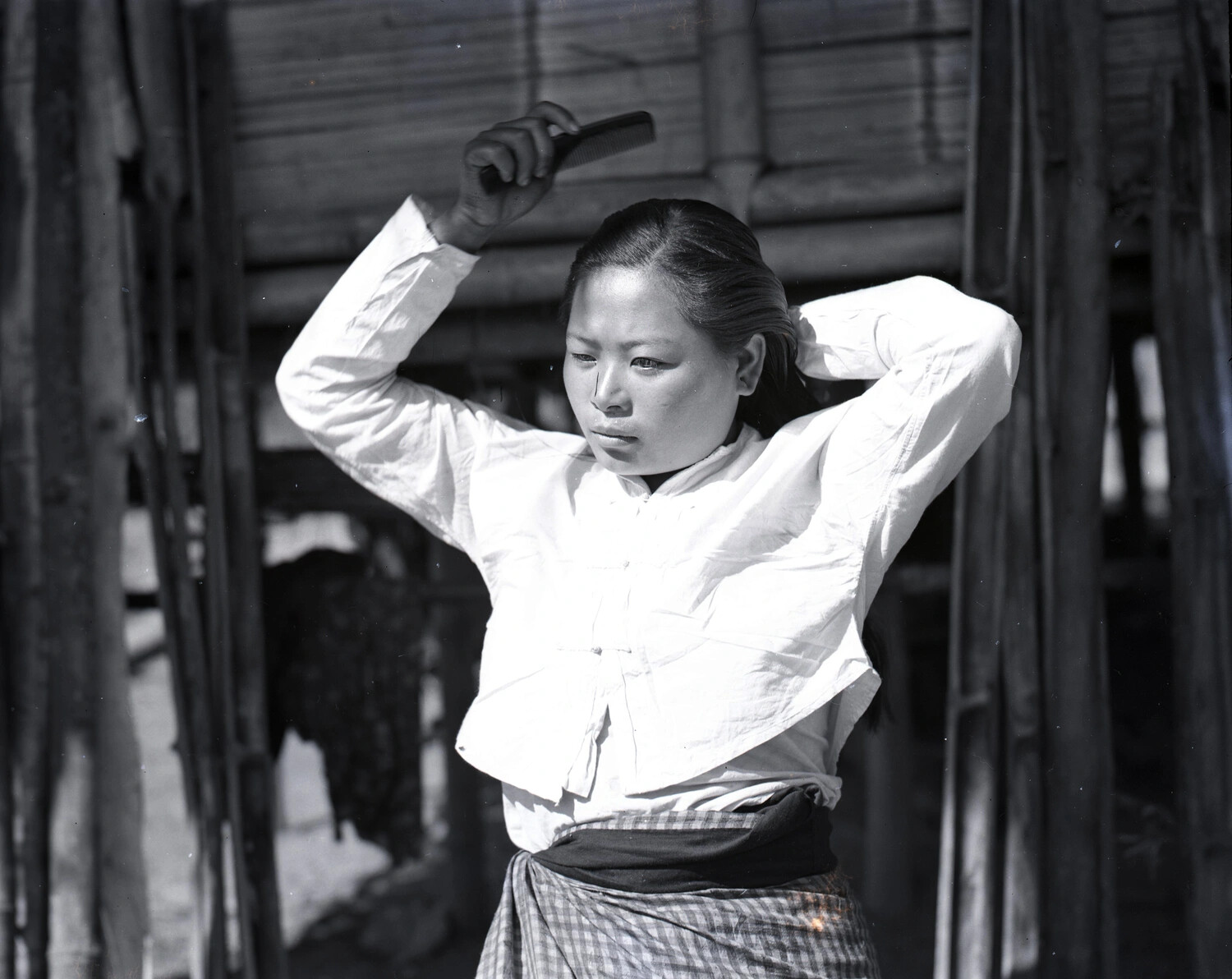Burmese Woman Combing Her Hair, WWII China-Burma-India Theater Collection