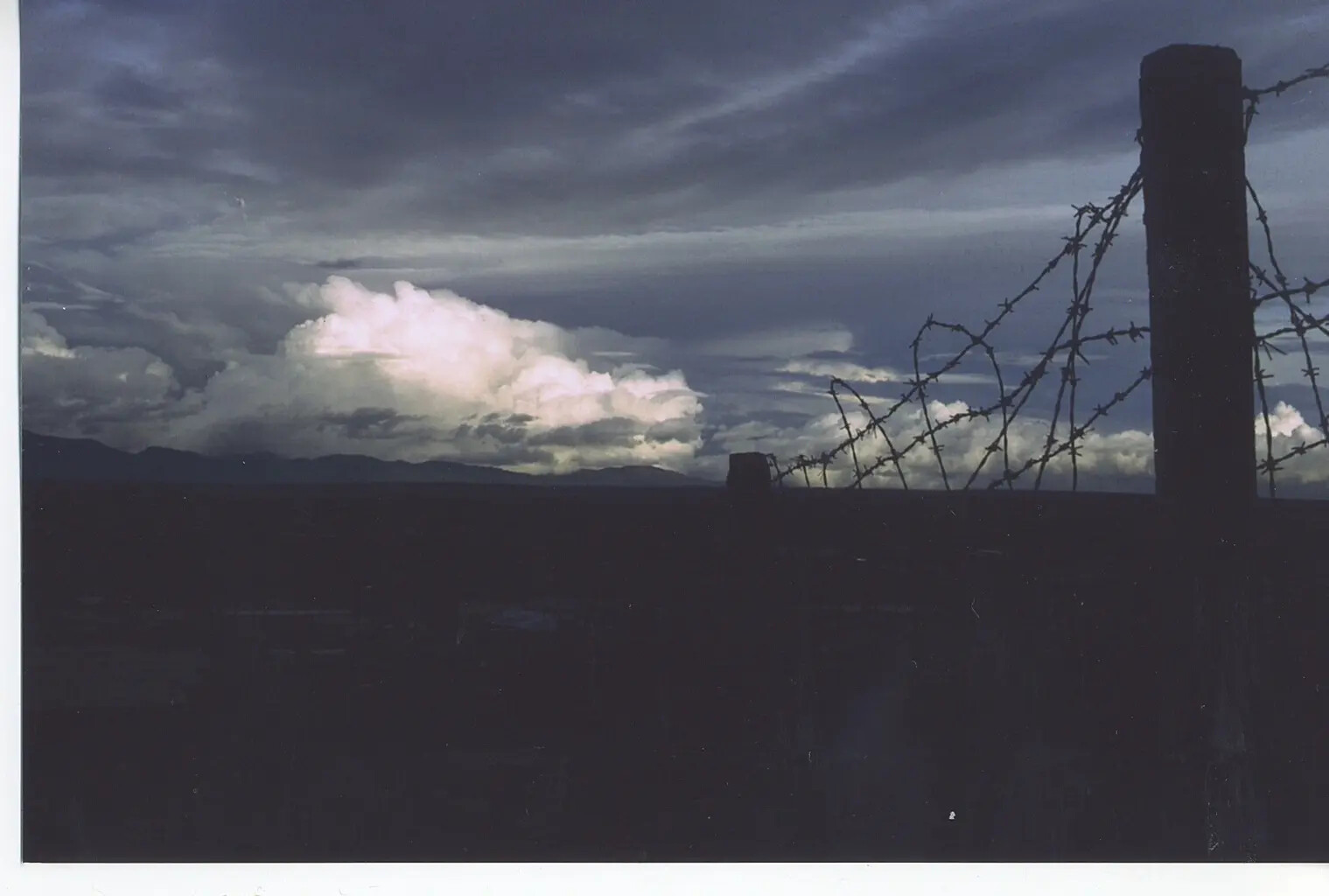Barbed Wire Perimeter Fence at Dusk, Vietnam War Era Air Base (Variant)