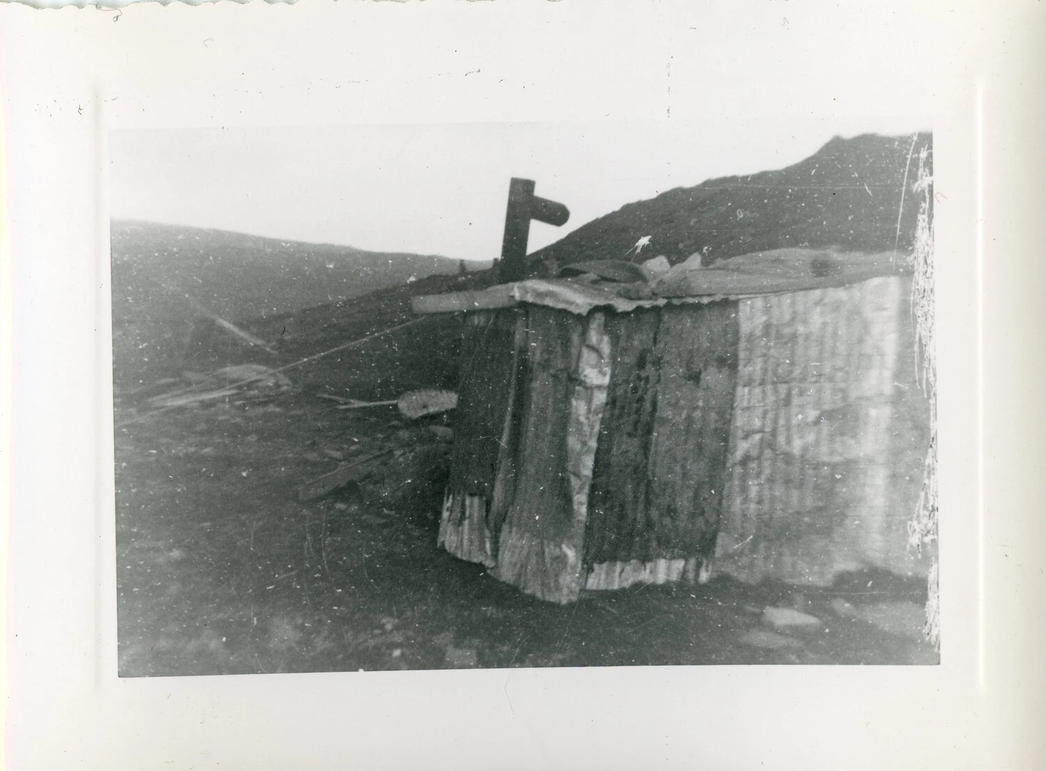 Corrugated Metal Field Shelter on Barren Hillside, Aleutian Islands, World War II