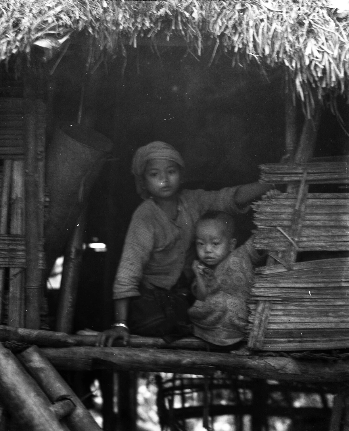 Hill-Tribe Children in Bamboo Stilt House Doorway, China-Burma-India Theater, WWII