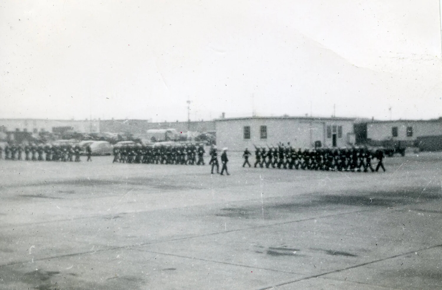 Marine Corps Troop Formation on Airfield Apron, WWII Era (VMF-214 Album, 1945)