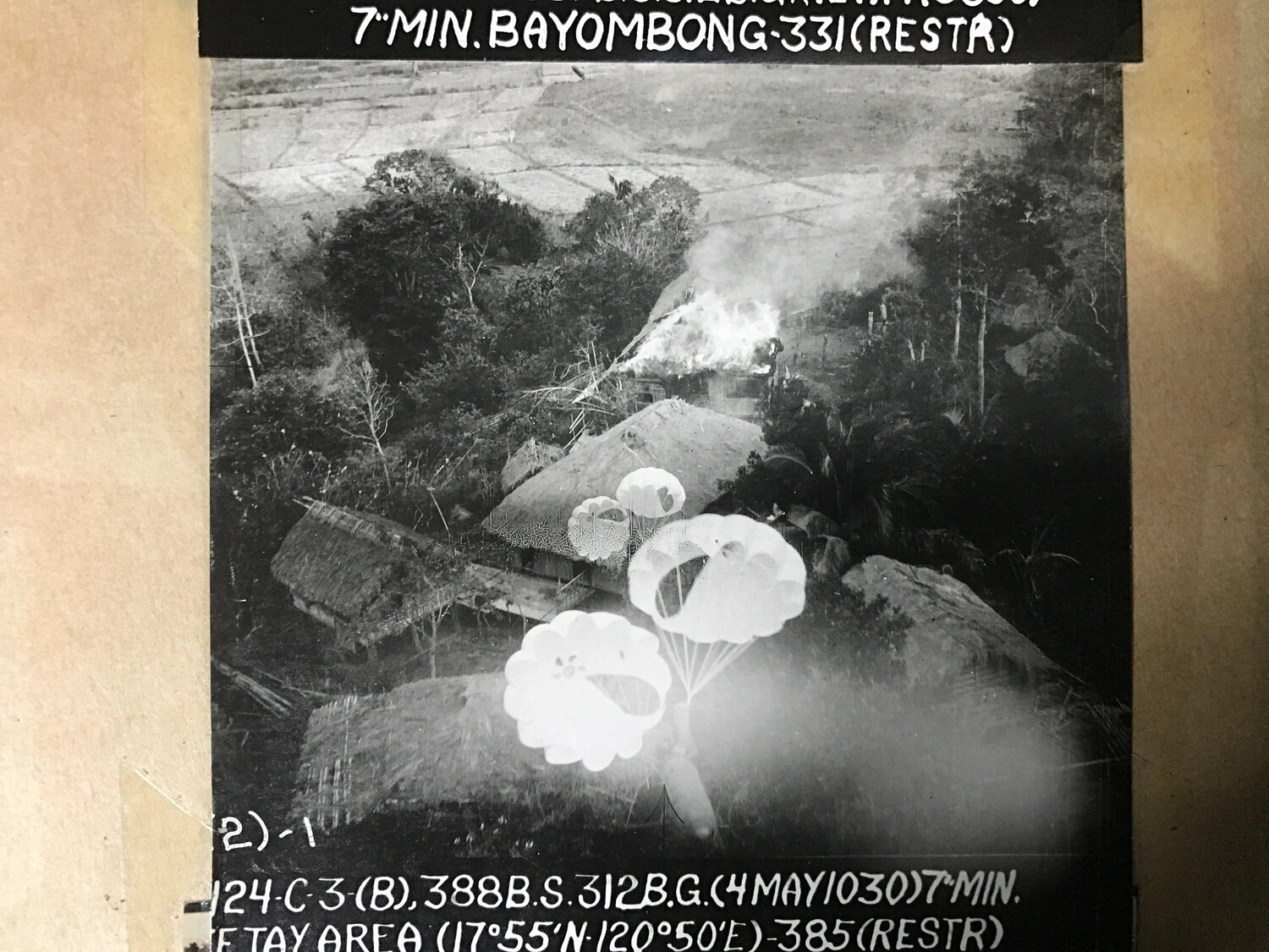 Official Strike Photograph No. 385(RESTR), 388th Bomb Squadron, 312th Bomb Group, Bayombong Area, Luzon, Philippines, 4 May 1945