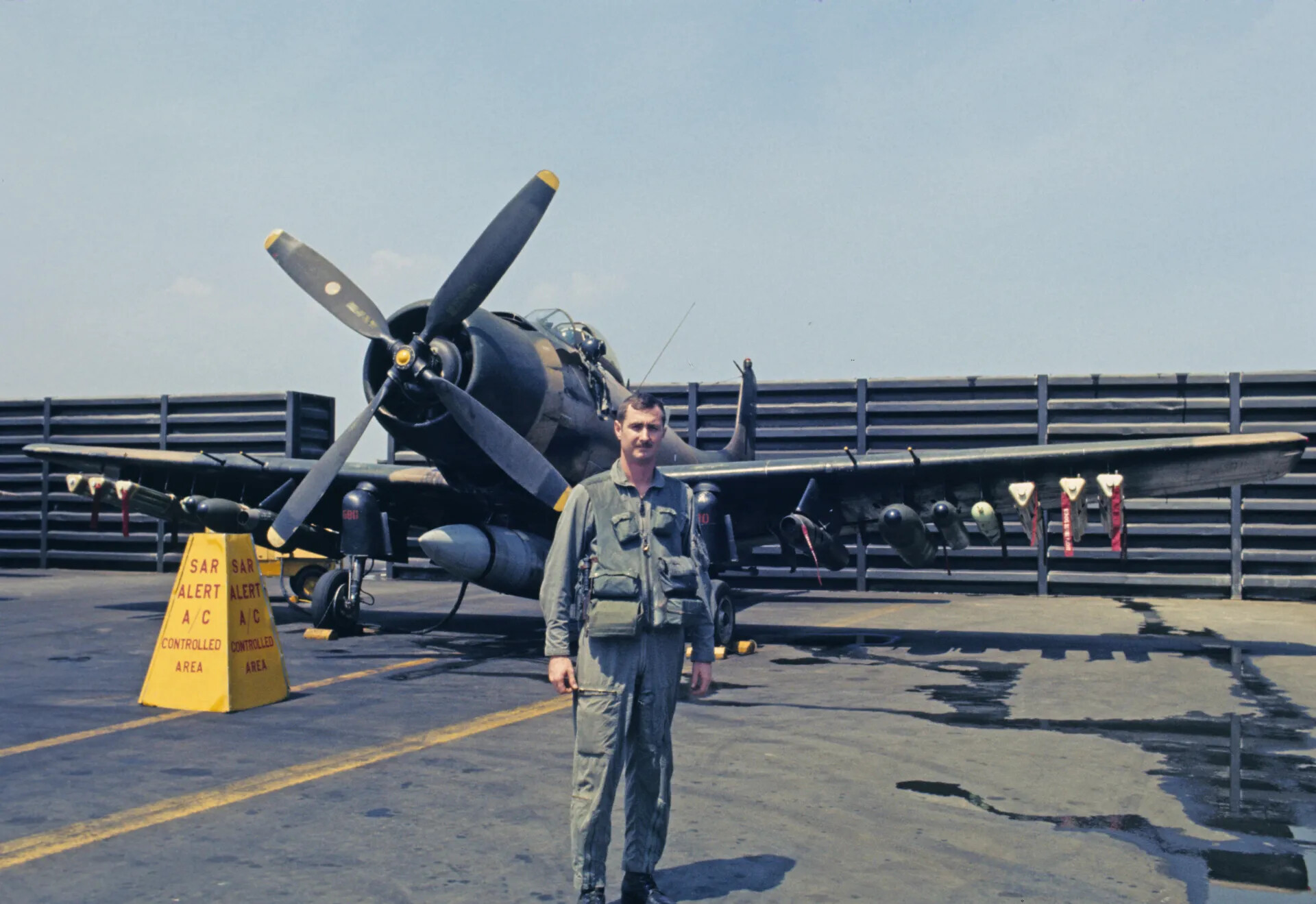 USAF Pilot Beside SAR-Alert A-1 Skyraider on Revetment Ramp, Vietnam War Era
