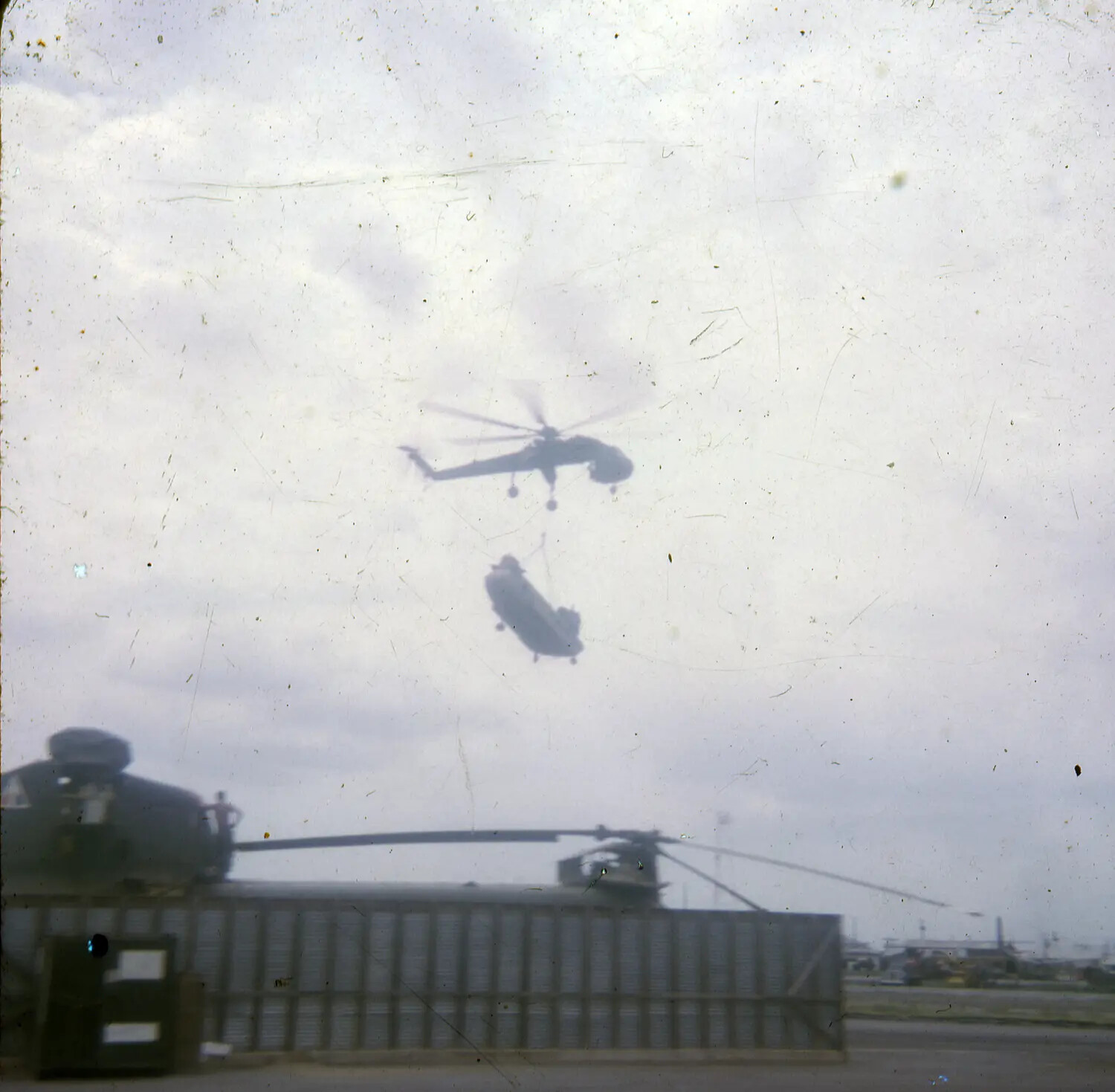 CH-54 Tarhe 'Flying Crane' Helicopter Carrying Slung Load, Vietnam War Era