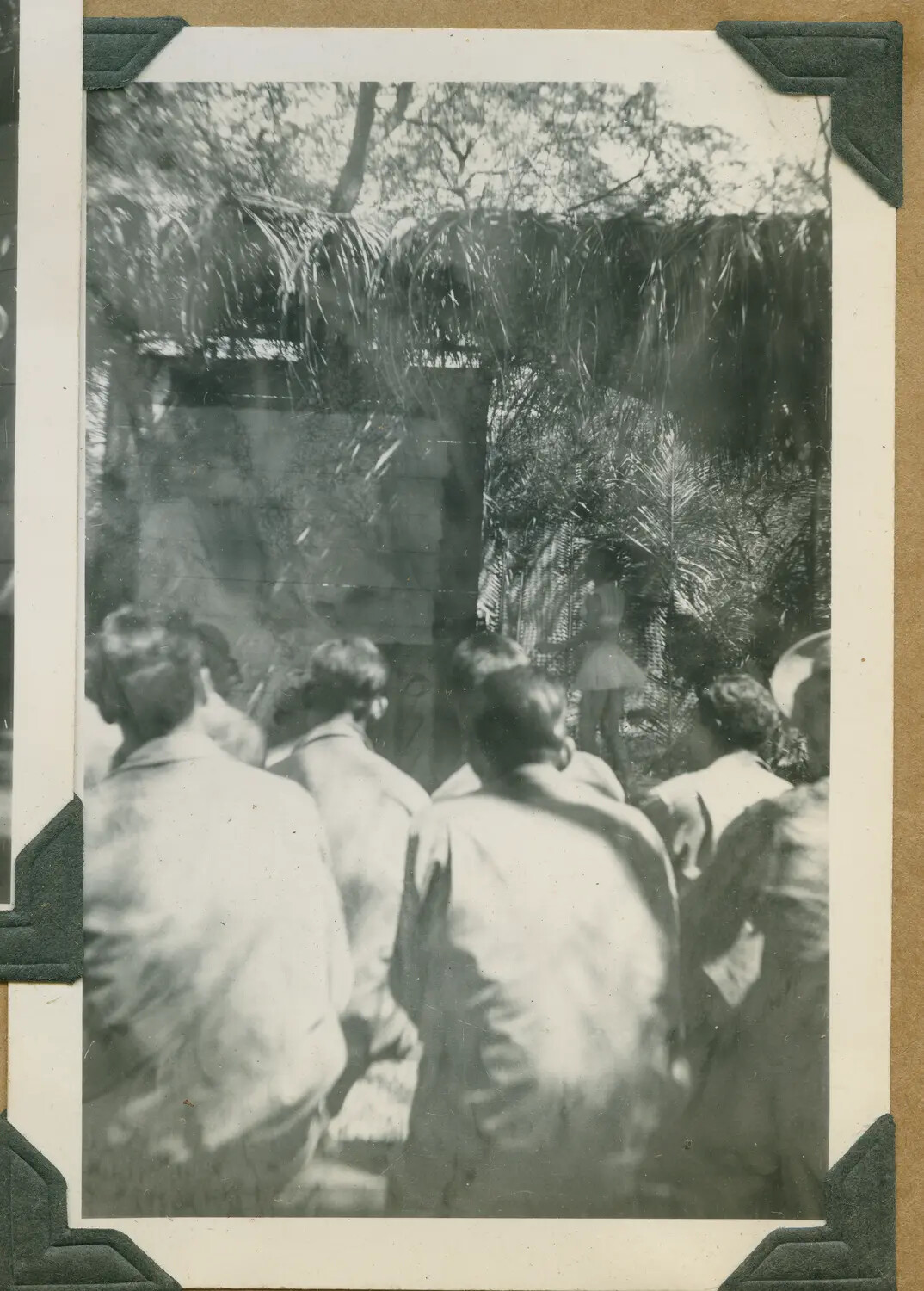 Sailors Approaching a Yard with Local Child, Hawaii, World War II Era