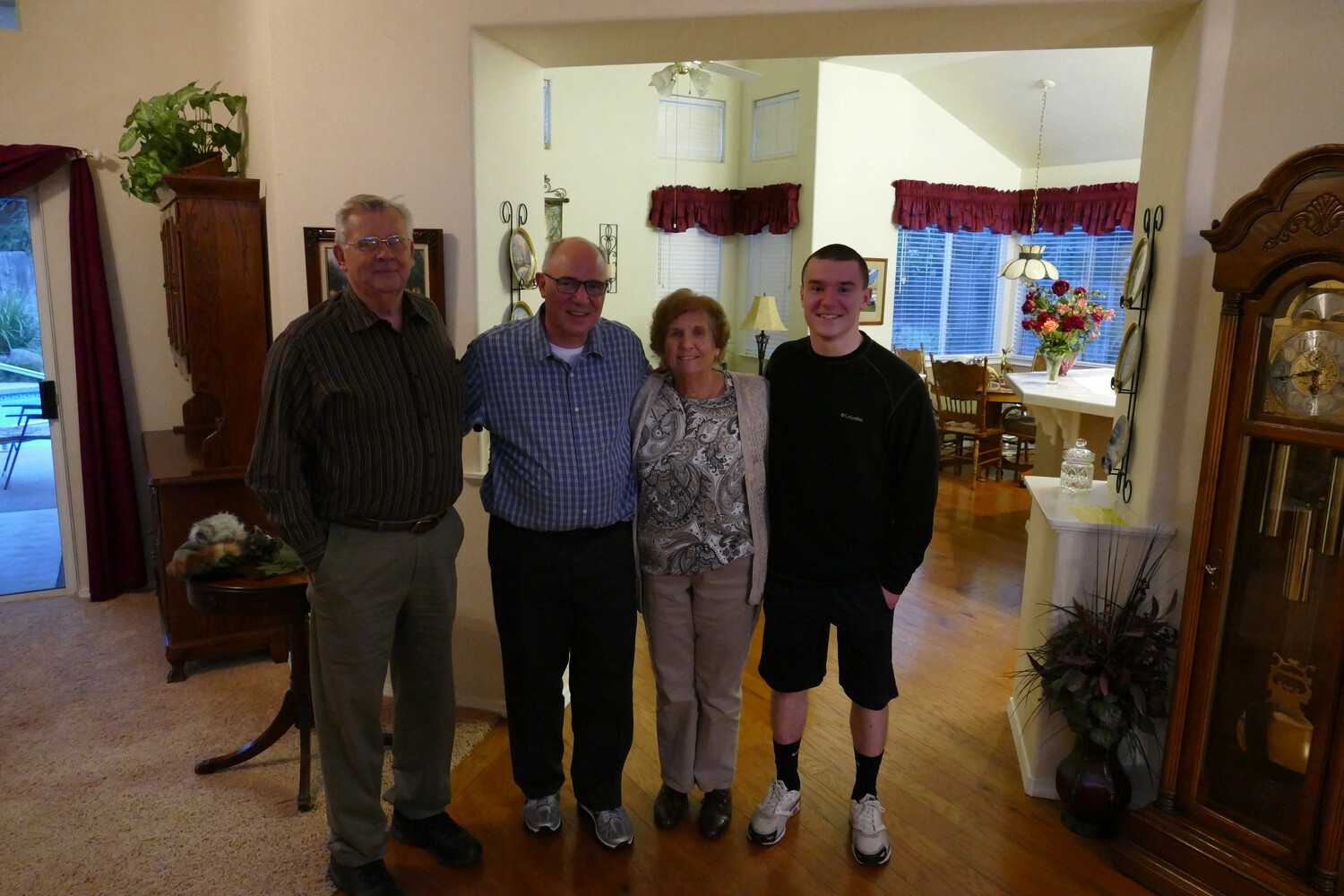Modern Family Group Portrait in a Residential Foyer (Not a Historical or Military Photograph)