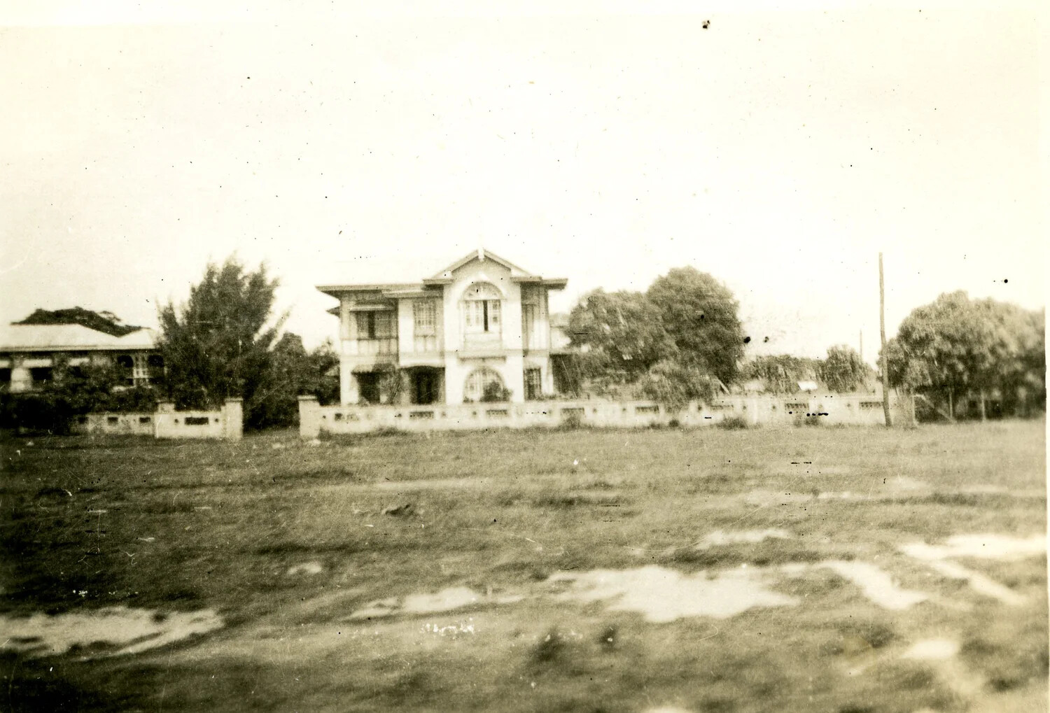 Two-Story Colonial-Style Residence Beyond Open Field, Philippines, WWII Photo Album