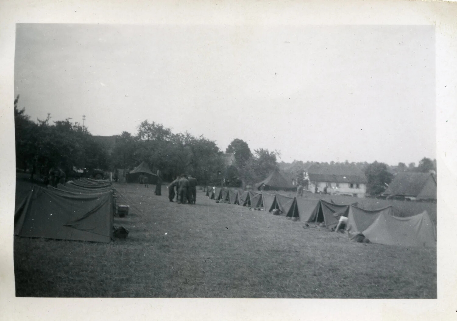 U.S. Army Tent Encampment Near a European Village, WWII European Theater
