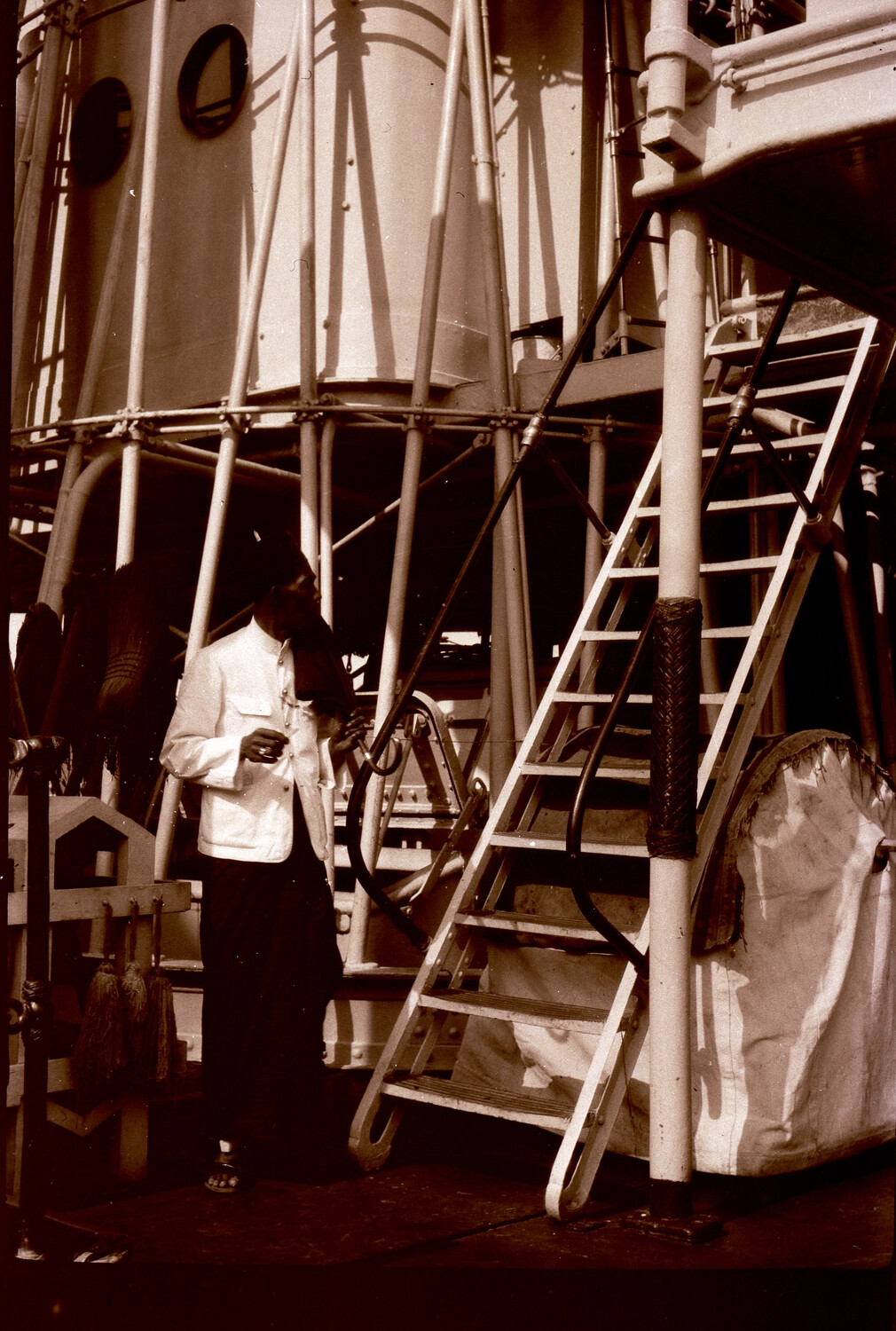 Shipboard Scene with Chinese Worker Near Ship's Stack, U.S. Navy China Station, 1930s