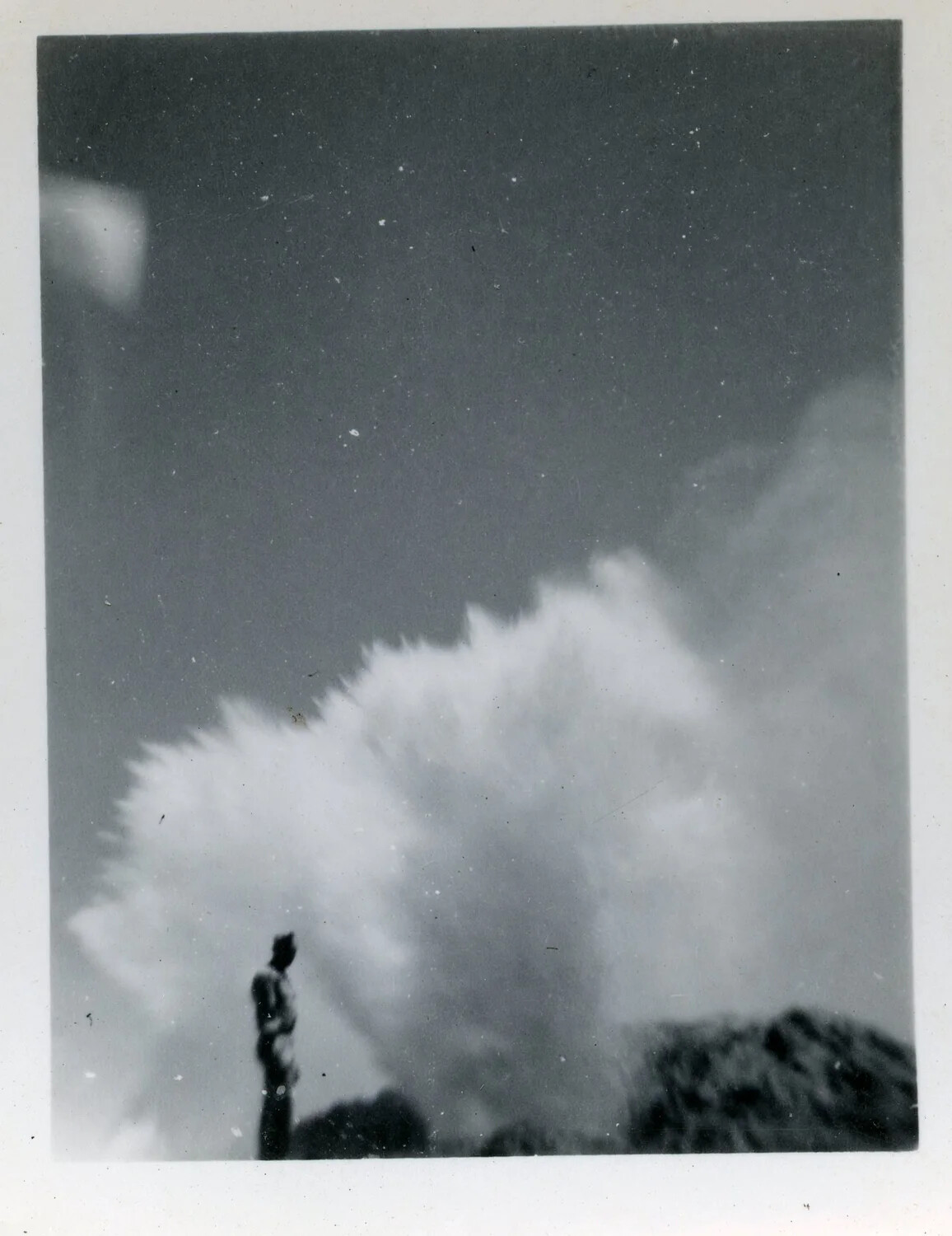 Serviceman Observing Large Explosion Cloud, World War II Pacific Theater
