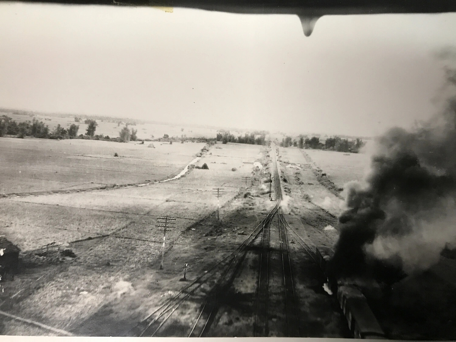 Aerial View of Railway Line During Low-Level Strike Mission, Likely 312th Bombardment Group, WWII Pacific Theater