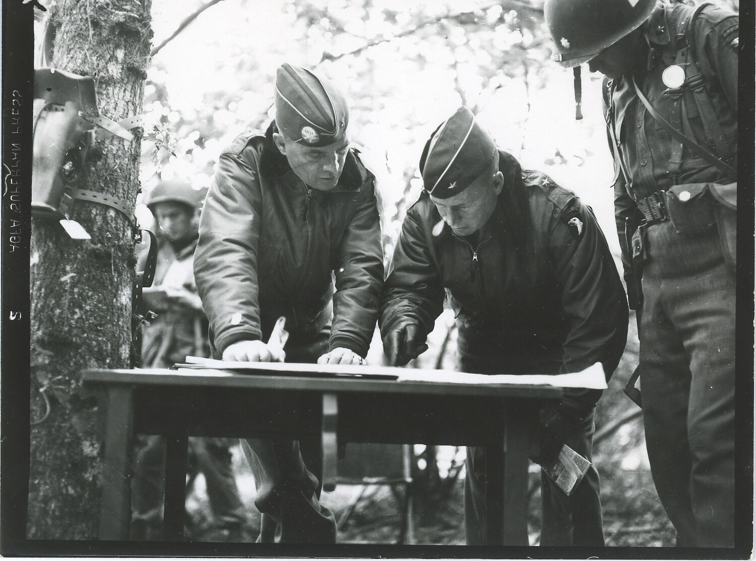 U.S. Army Officers Reviewing Map at Field Command Post, Bastogne Vicinity, Belgium, Battle of the Bulge, December 1944