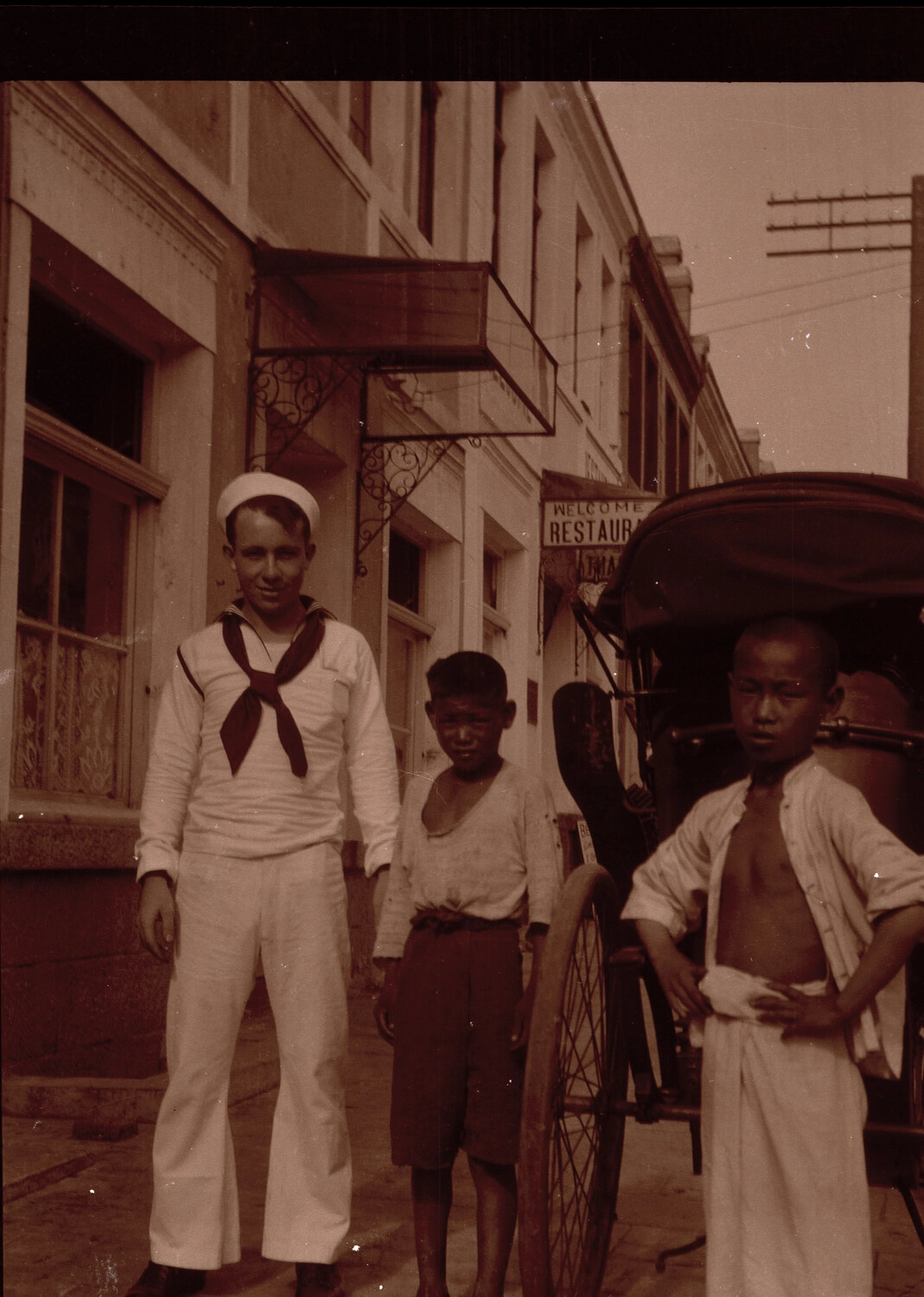 U.S. Navy Sailor with Local Boys and Rickshaw, China Treaty Port, 1930s